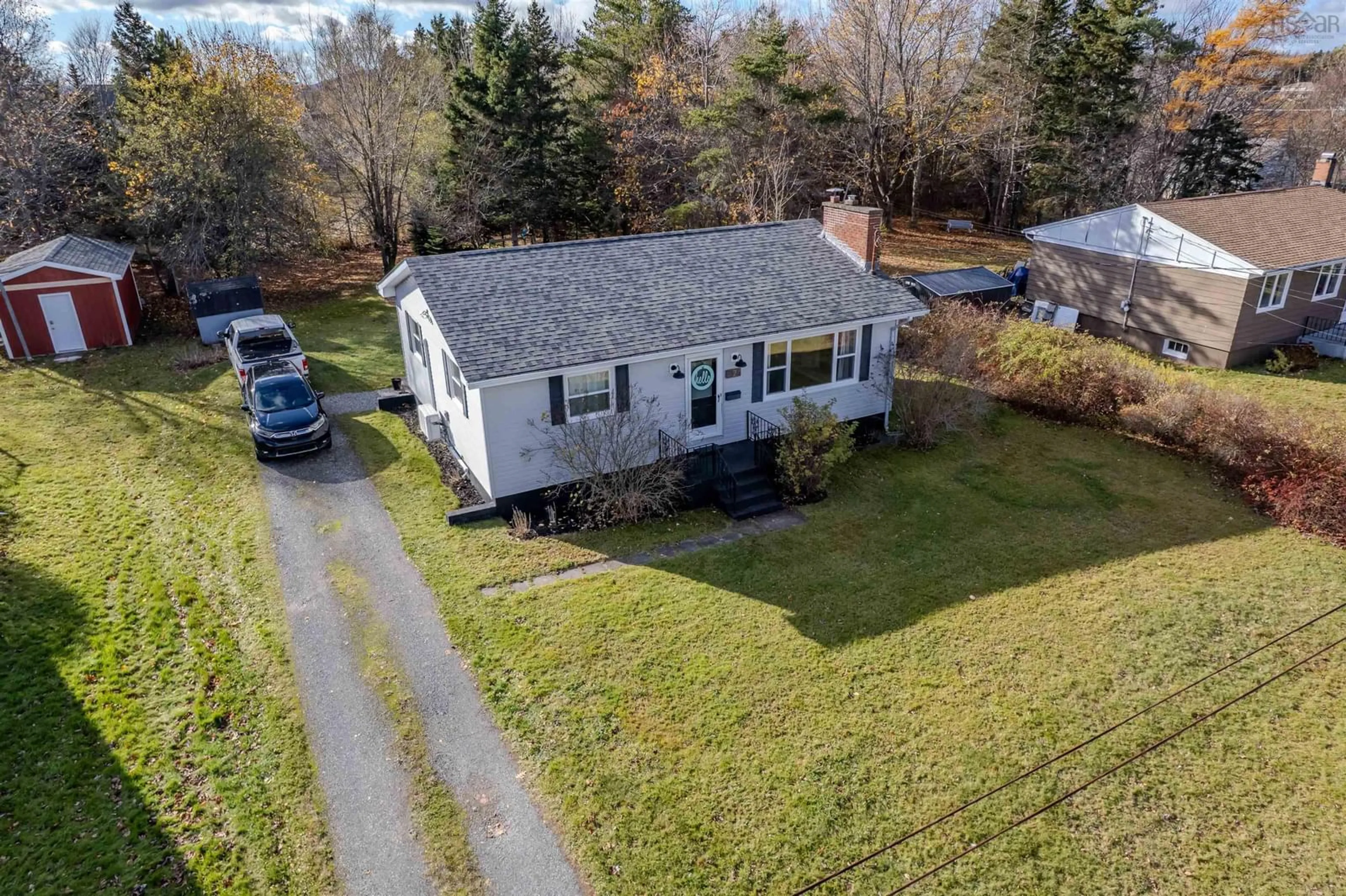 A pic from outside/outdoor area/front of a property/back of a property/a pic from drone, street for 24 Hillcrest Dr, Coxheath Nova Scotia B1R 1V2