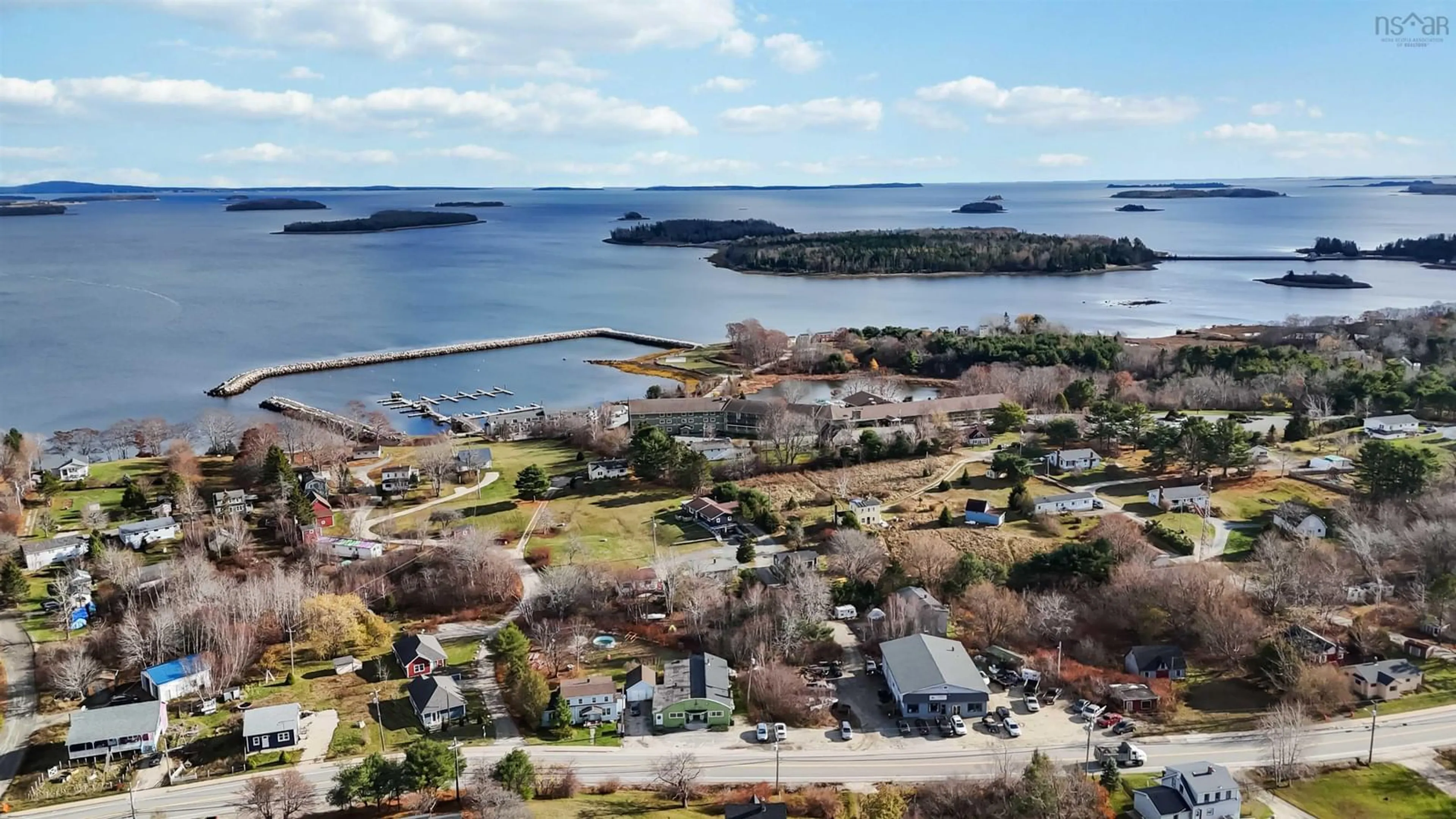 A pic from outside/outdoor area/front of a property/back of a property/a pic from drone, water/lake/river/ocean view for 6517 Highway 3, Western Shore Nova Scotia B0J 3M0