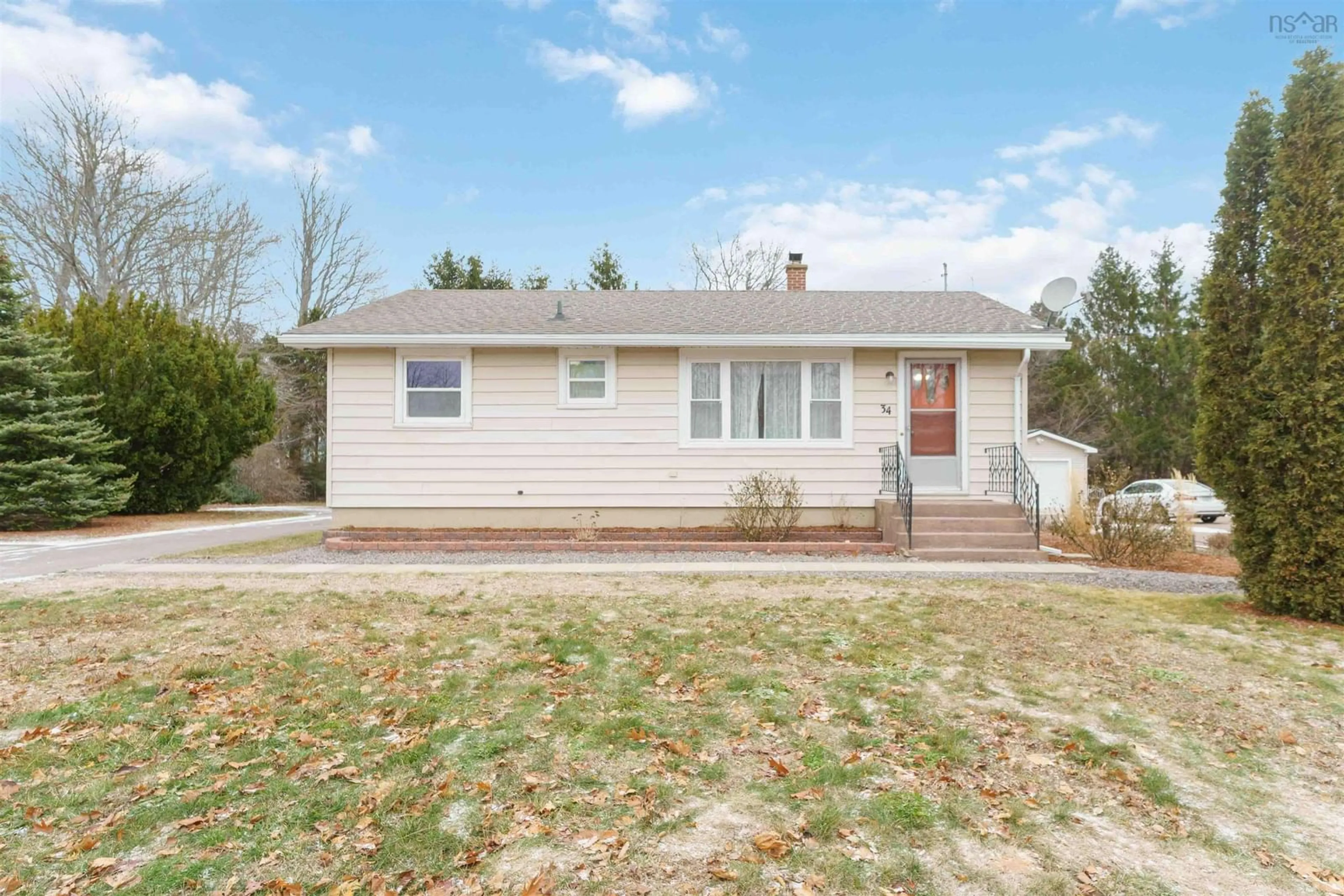 Home with vinyl exterior material, street for 34 Taylor Dr, Middleton Nova Scotia B0S 1P0
