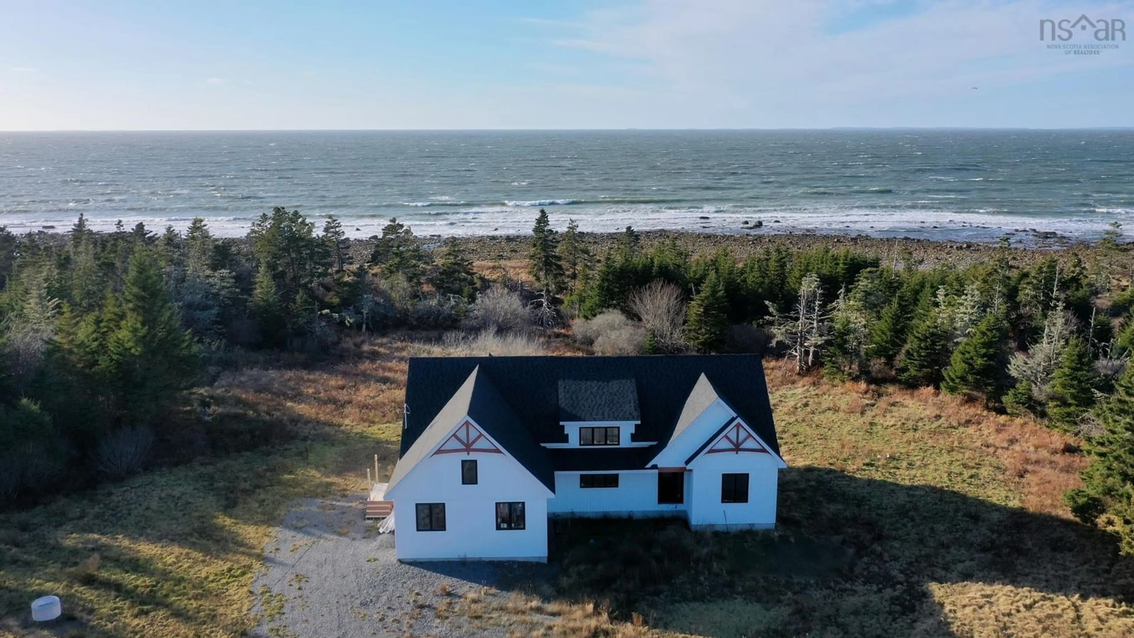 A pic from outside/outdoor area/front of a property/back of a property/a pic from drone, water/lake/river/ocean view for 8433 Highway 3, Charlesville Nova Scotia B0W 3B0