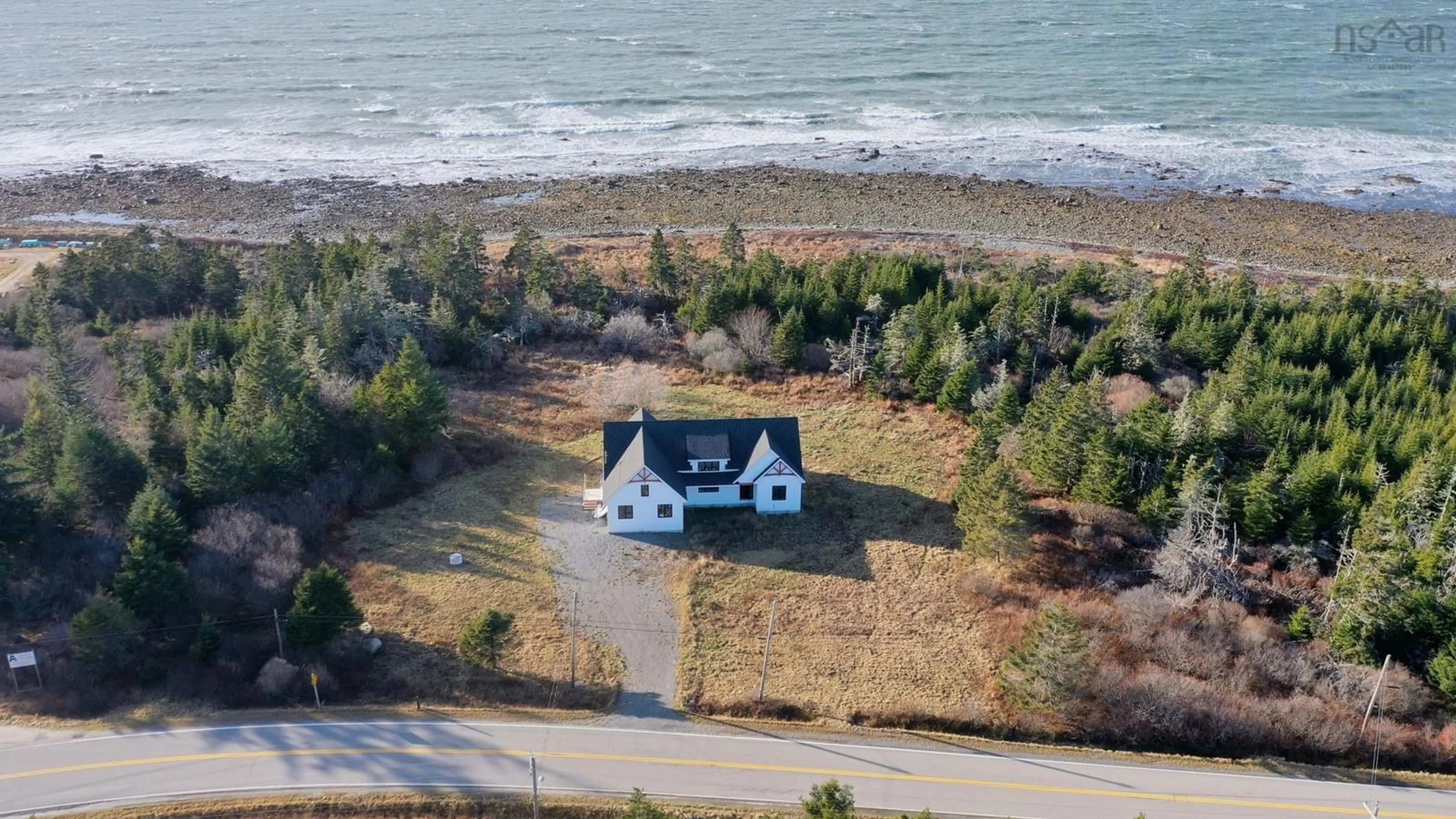A pic from outside/outdoor area/front of a property/back of a property/a pic from drone, water/lake/river/ocean view for 8433 Highway 3, Charlesville Nova Scotia B0W 3B0