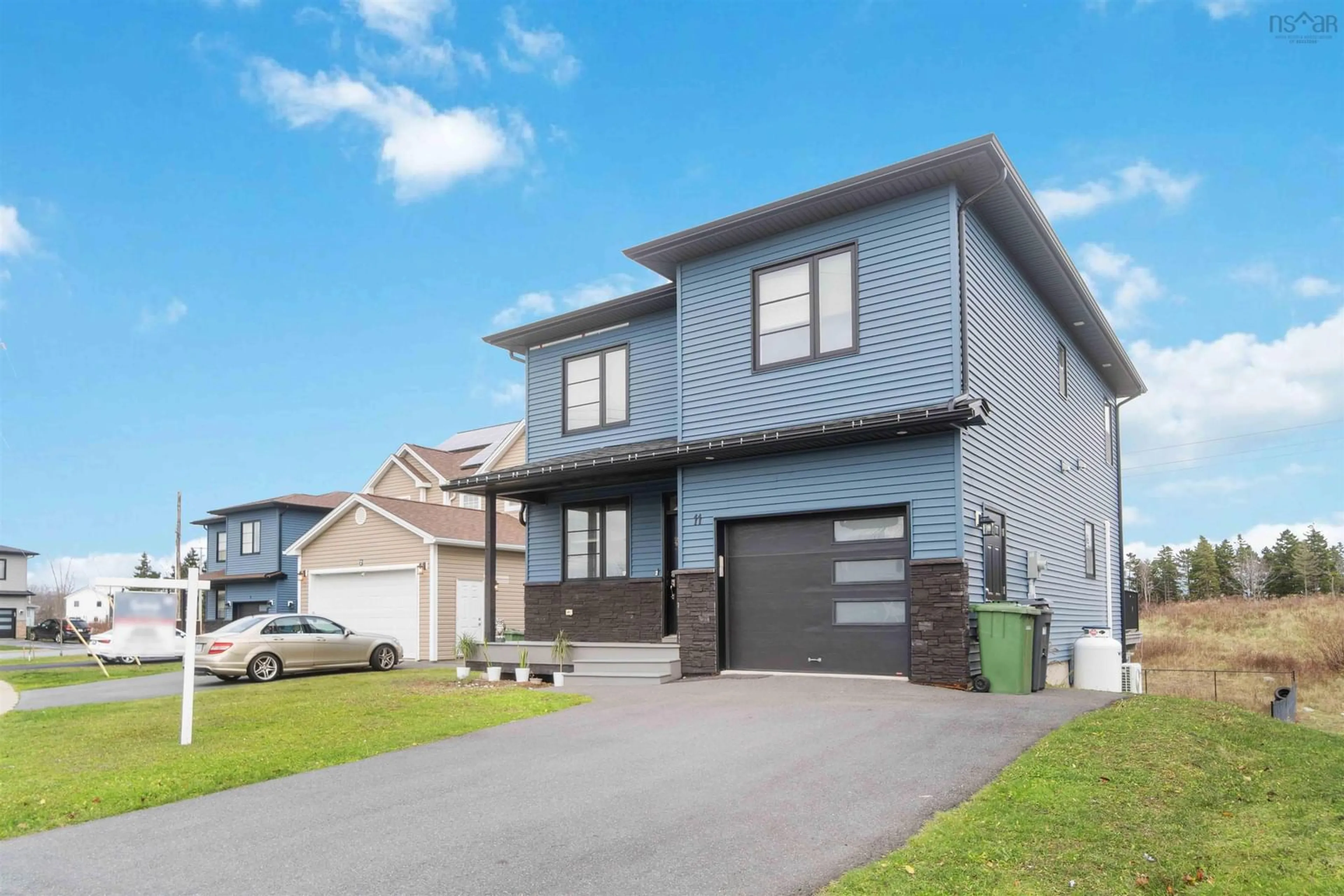 Home with vinyl exterior material, street for 11 Poonam Crt, Dartmouth Nova Scotia B2X 0B6