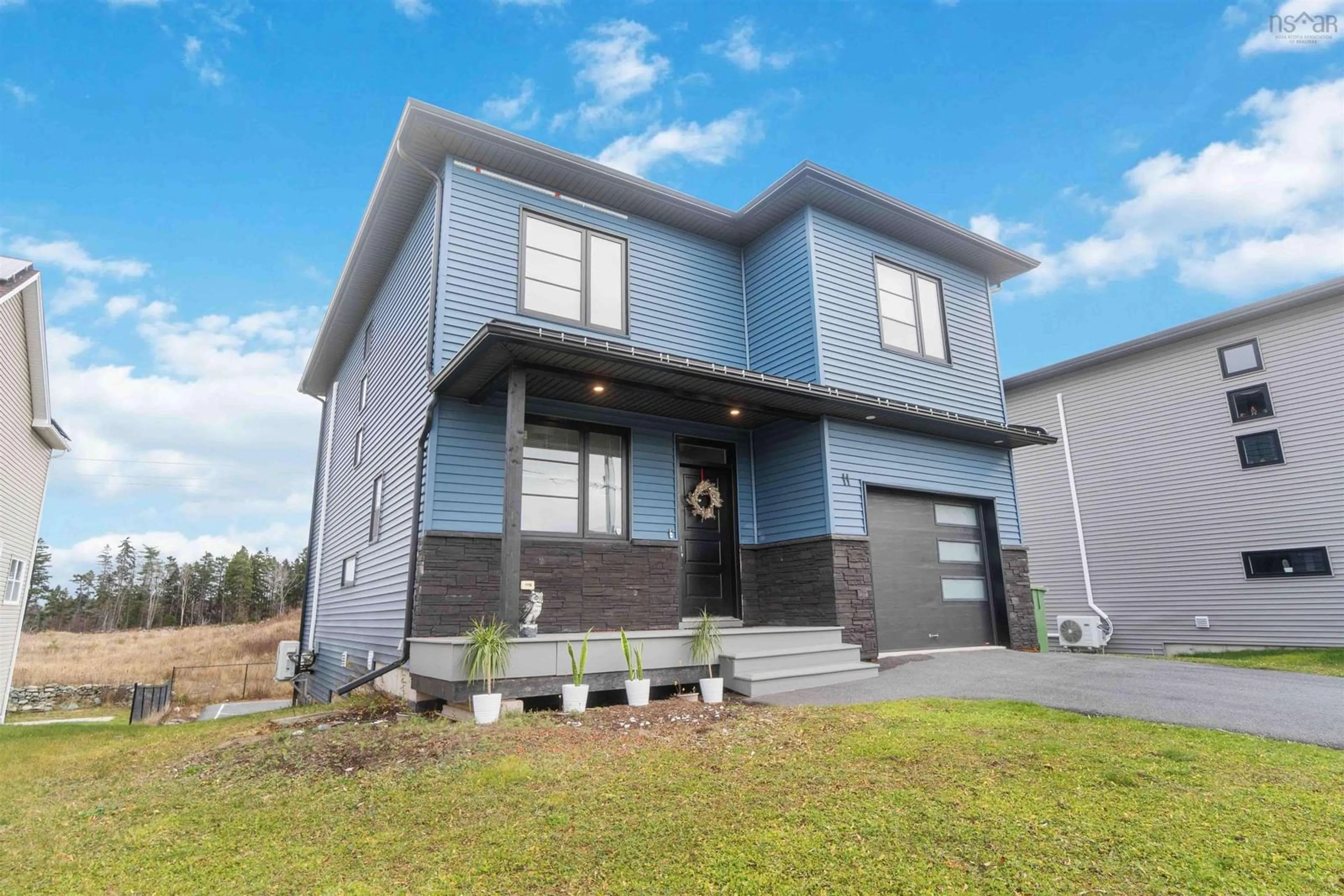 Home with brick exterior material, building for 11 Poonam Crt, Dartmouth Nova Scotia B2X 0B6