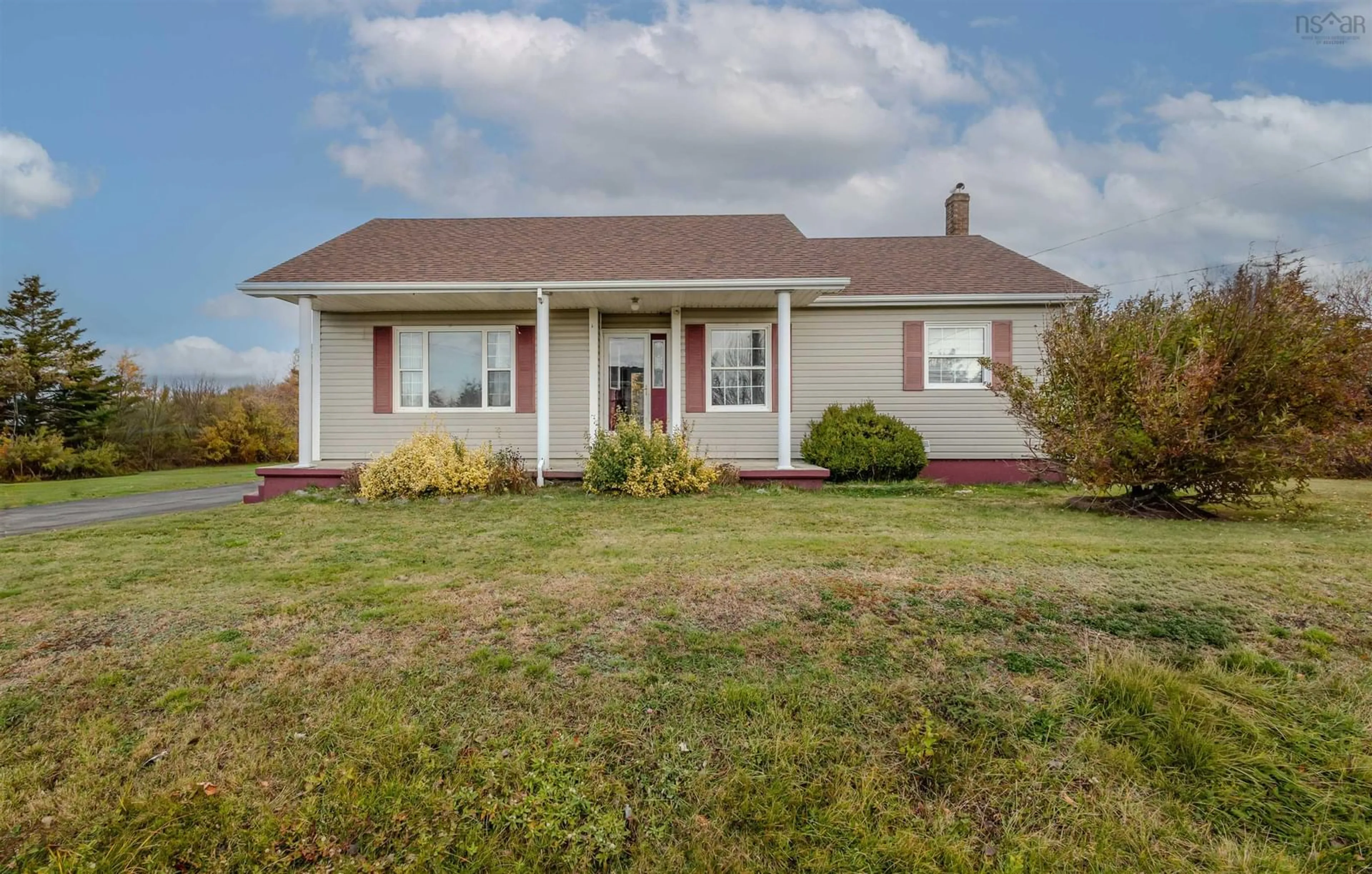 Home with vinyl exterior material, street for 47 Daley Rd, New Victoria Nova Scotia B1H 4Z5