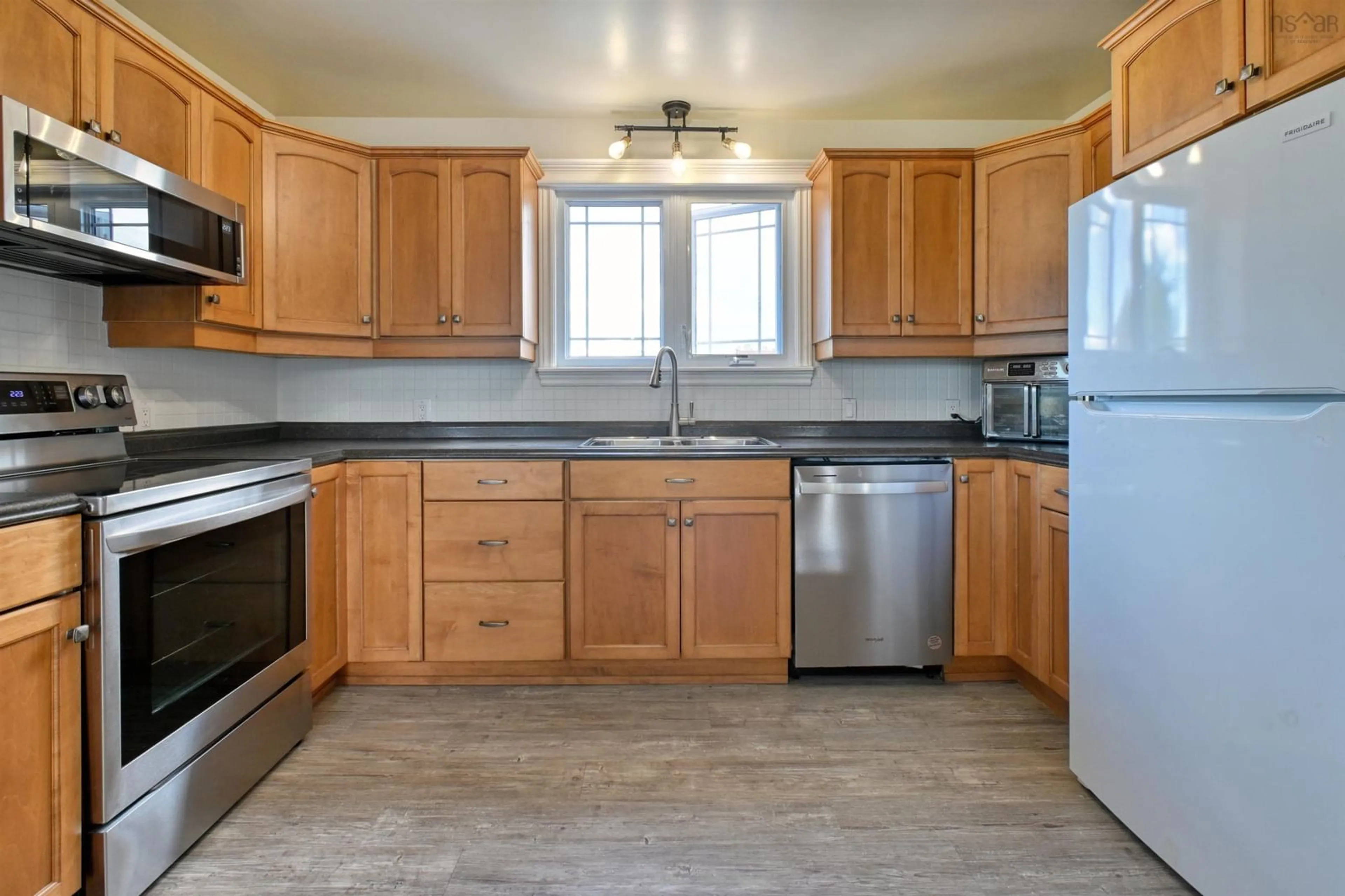Standard kitchen, ceramic/tile floor for 9307 Pepperell St, St. Peter's Nova Scotia B0E 3B0