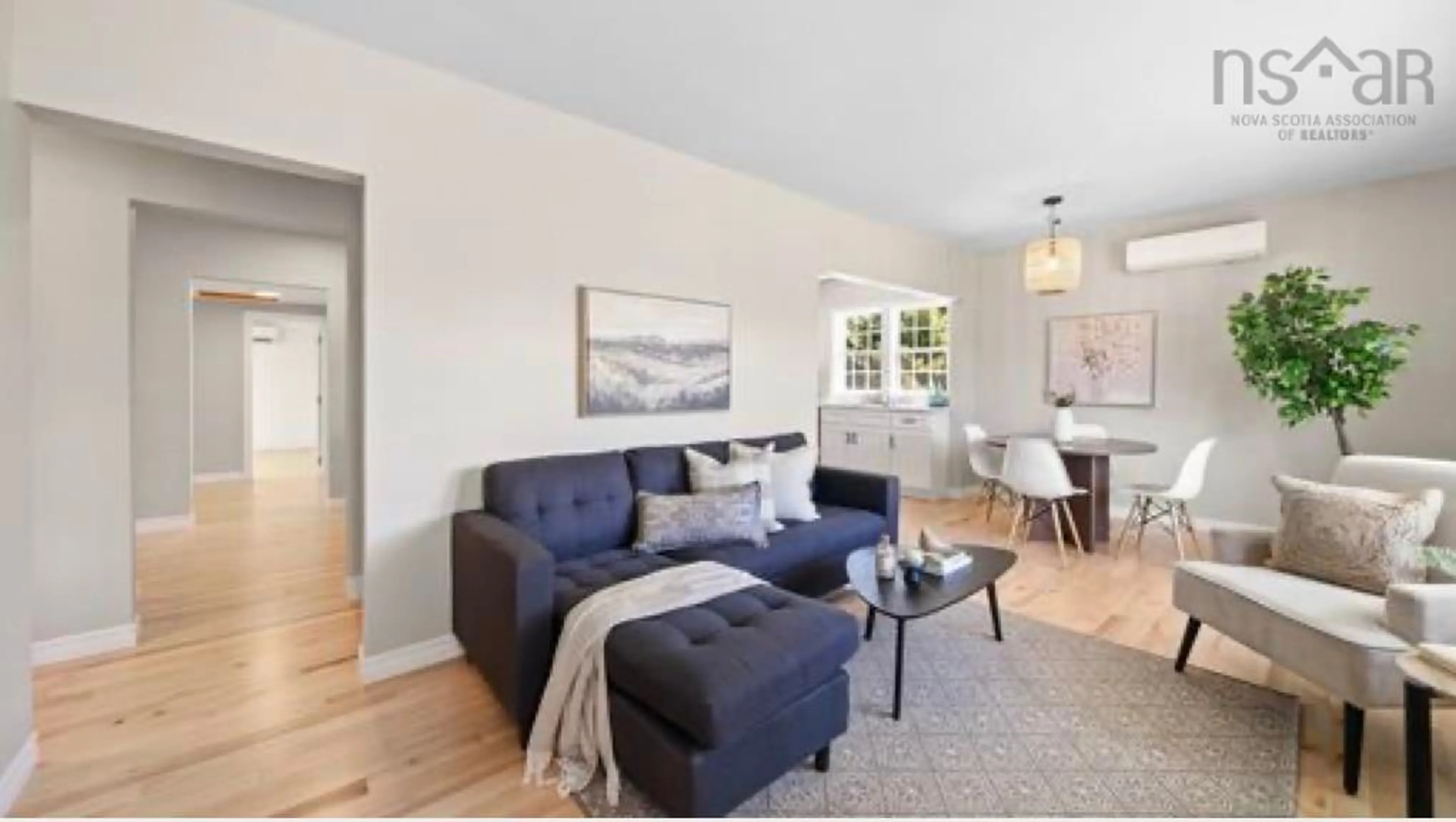 Living room with furniture, wood/laminate floor for 6 Birchfield Cres, Spryfield Nova Scotia B3R 2E7