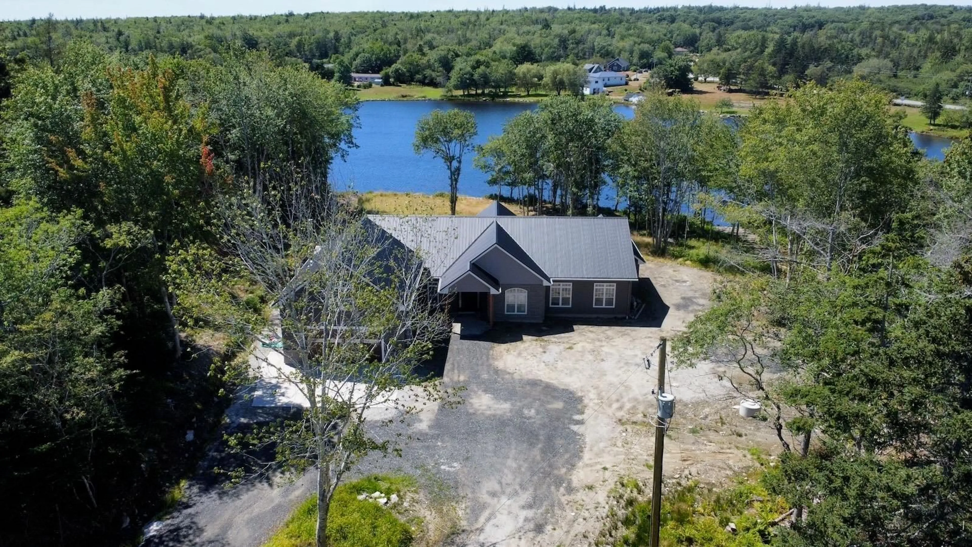 A pic from outside/outdoor area/front of a property/back of a property/a pic from drone, water/lake/river/ocean view for 36 Belleville Rd, Belleville North Nova Scotia B0W 3M0