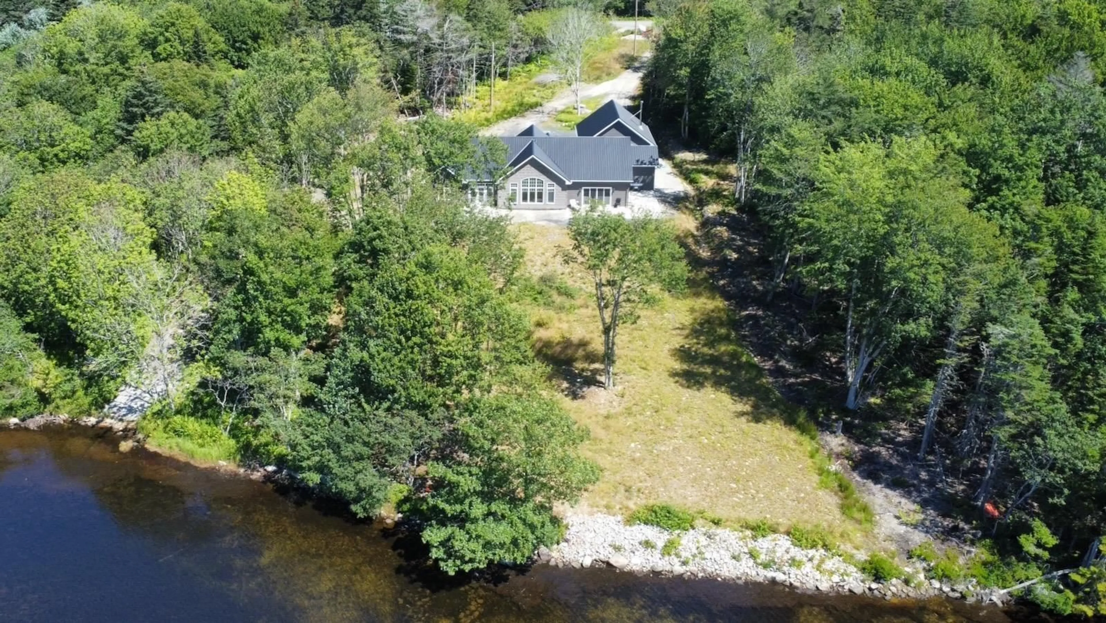 A pic from outside/outdoor area/front of a property/back of a property/a pic from drone, water/lake/river/ocean view for 36 Belleville Rd, Belleville North Nova Scotia B0W 3M0