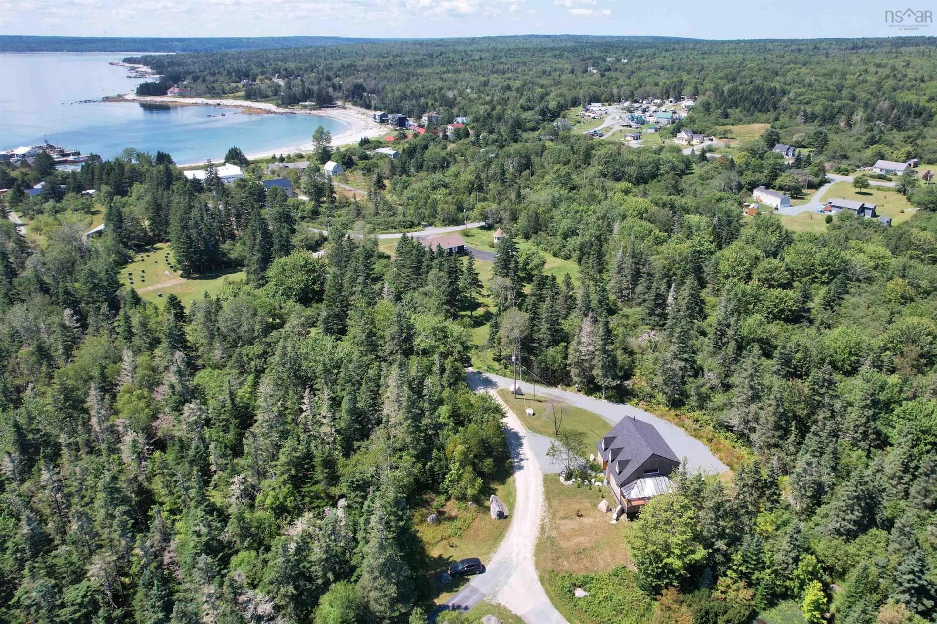 A pic from outside/outdoor area/front of a property/back of a property/a pic from drone, forest/trees view for 51 Everetts Way, Hunts Point Nova Scotia B0T 1G0