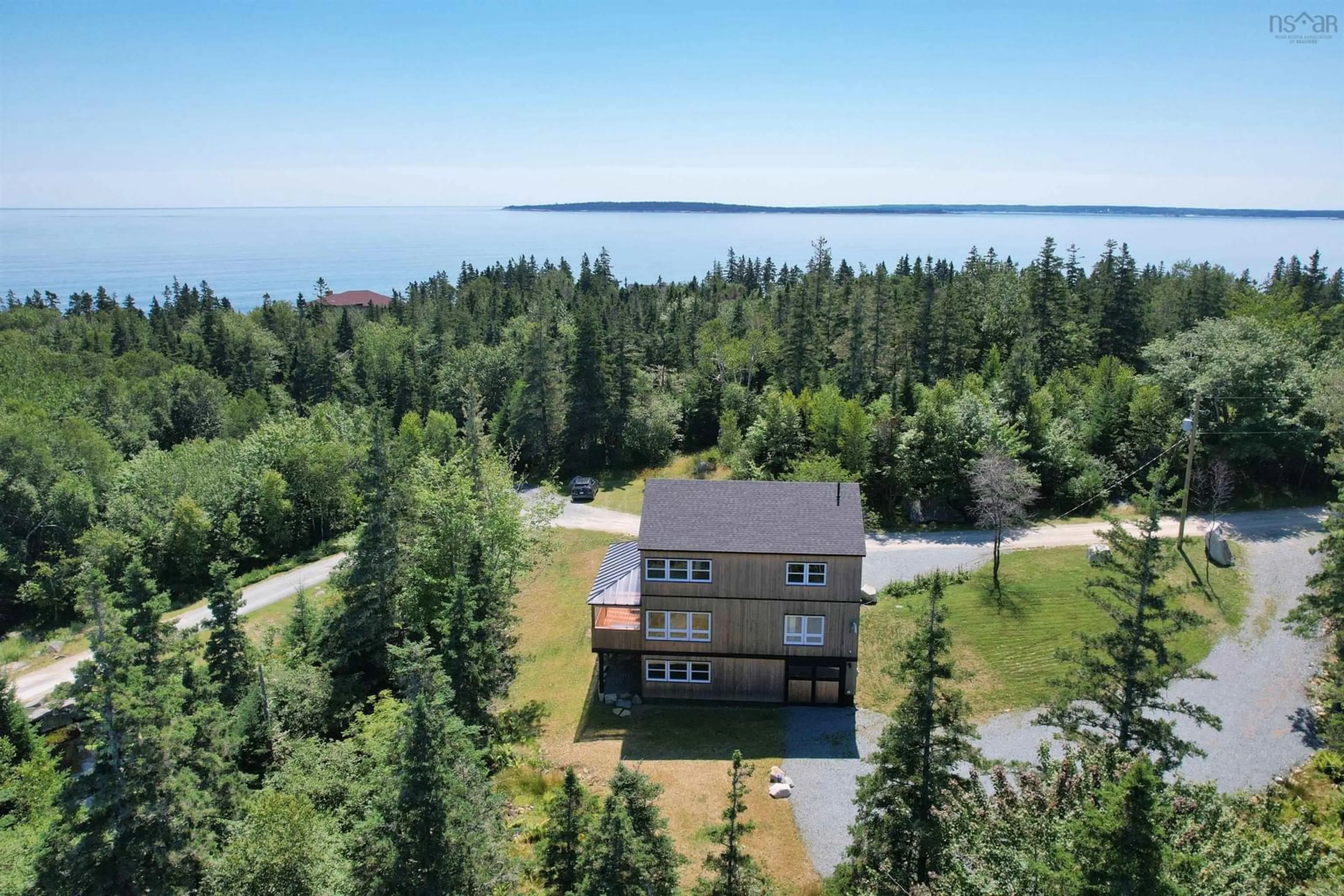 A pic from outside/outdoor area/front of a property/back of a property/a pic from drone, water/lake/river/ocean view for 51 Everetts Way, Hunts Point Nova Scotia B0T 1G0