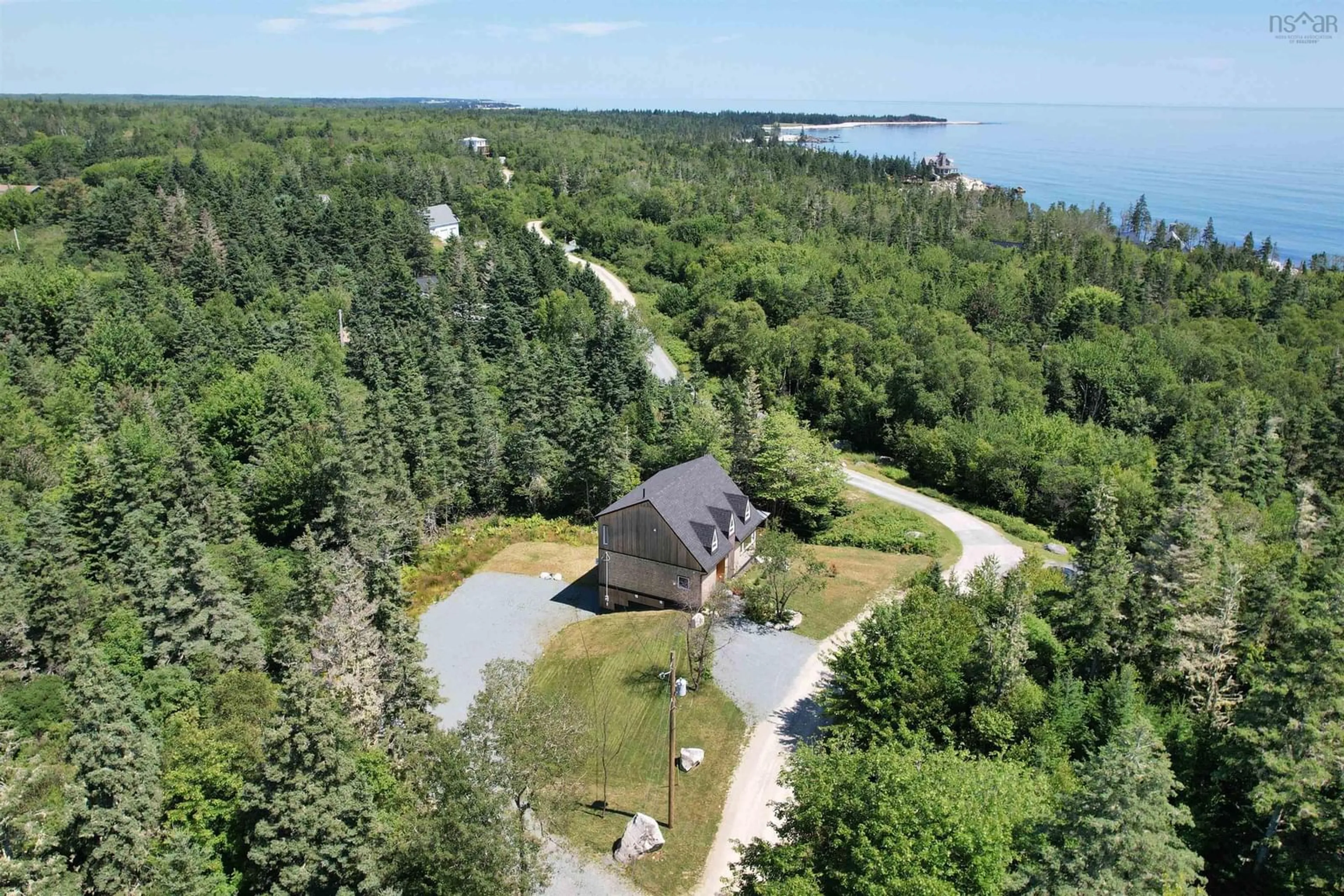 A pic from outside/outdoor area/front of a property/back of a property/a pic from drone, water/lake/river/ocean view for 51 Everetts Way, Hunts Point Nova Scotia B0T 1G0
