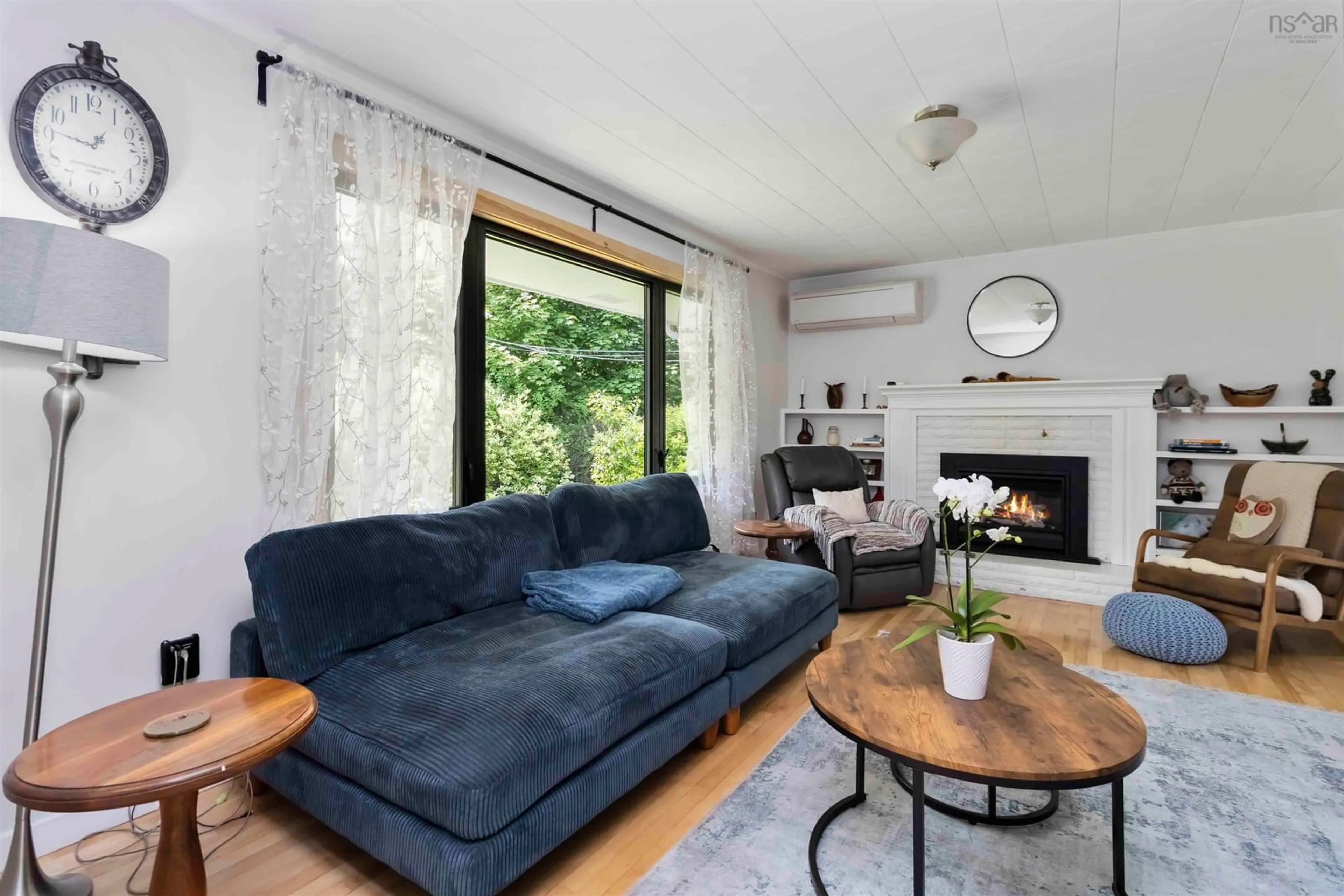 Living room with furniture, wood/laminate floor for 51 Albert St, Bridgewater Nova Scotia B4V 1G7