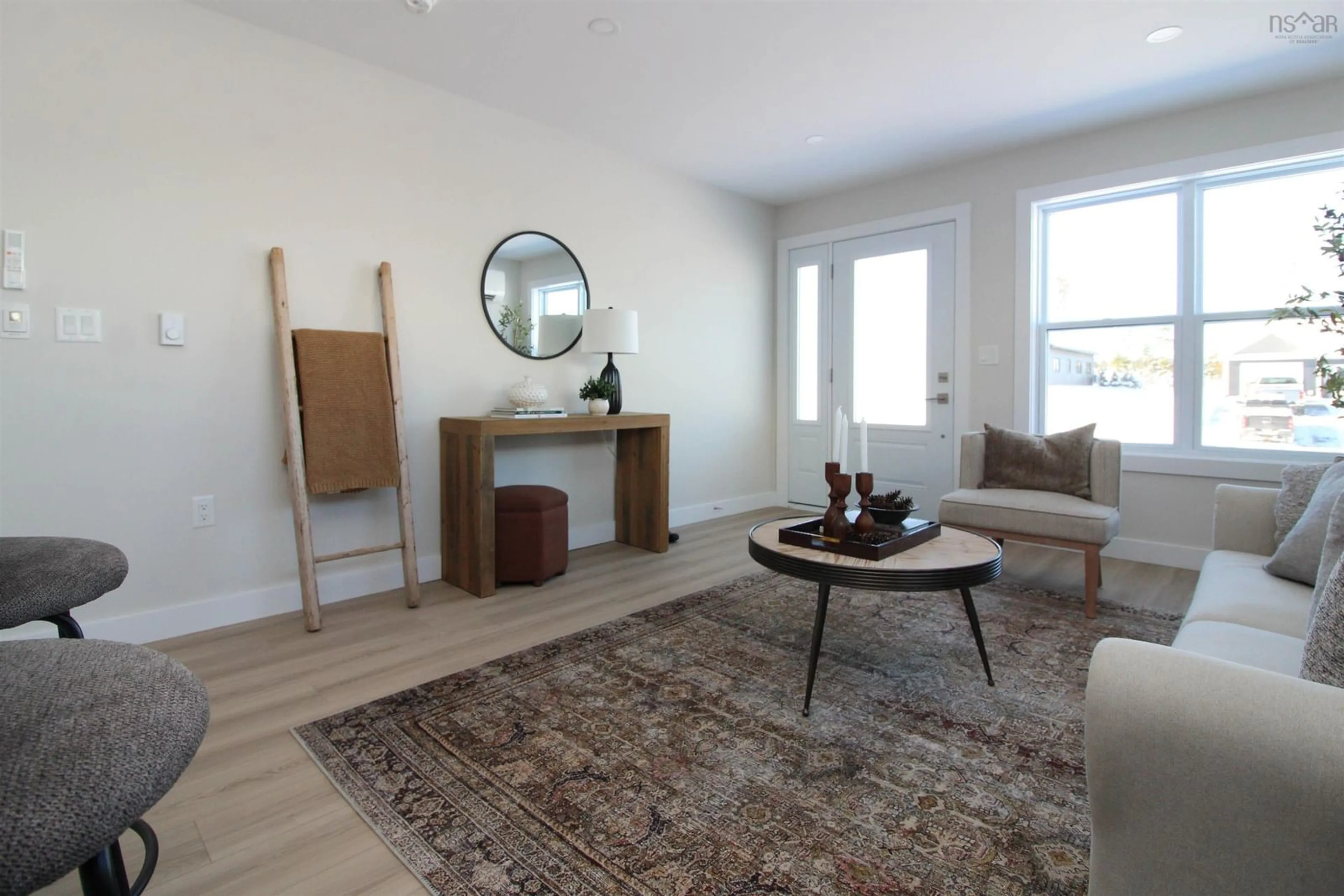Living room with furniture, wood/laminate floor for 145 Blainedale Dr, Salmon River Nova Scotia B2N 6M3