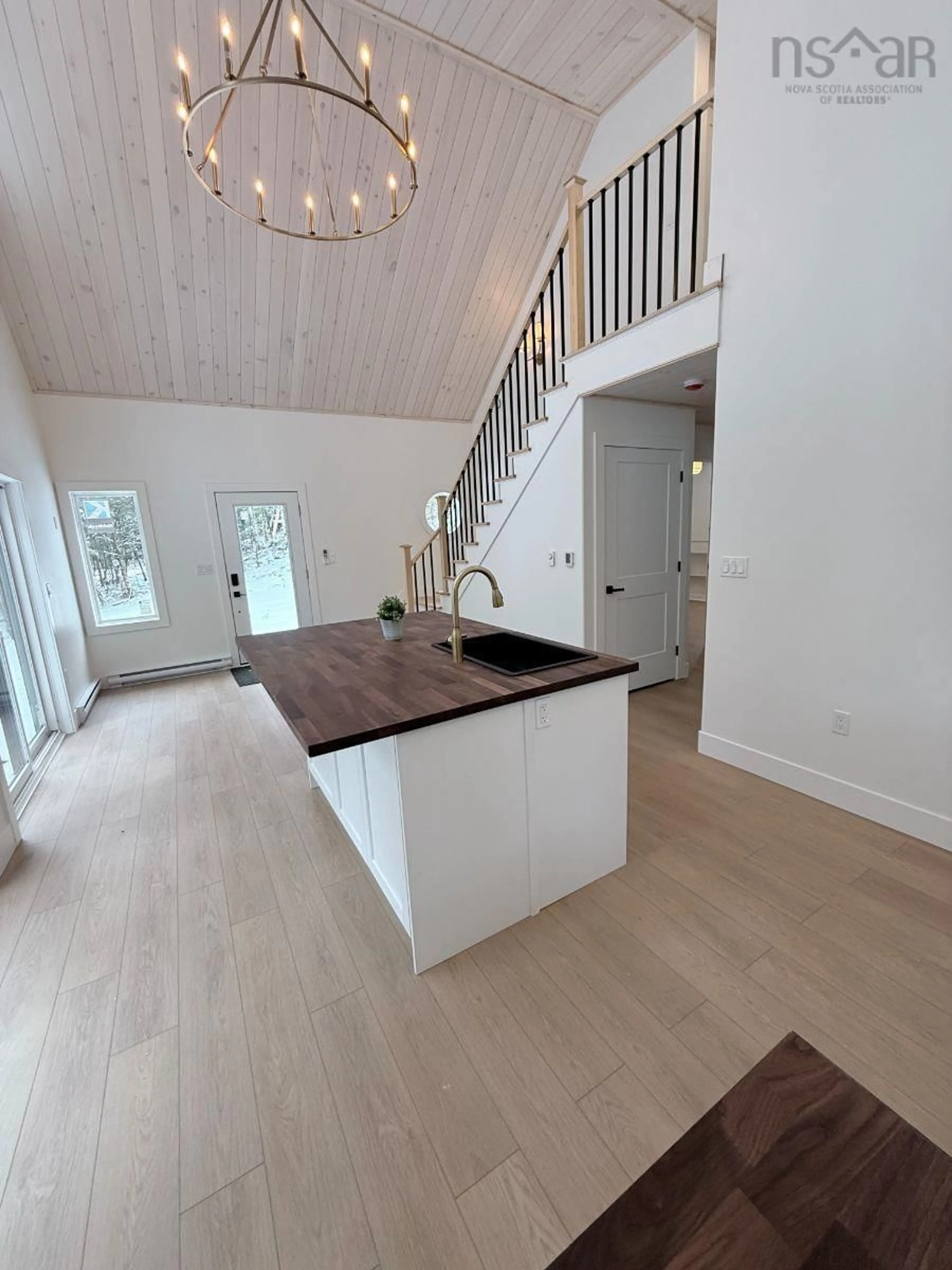 Open concept kitchen, wood/laminate floor for 852 Moose Pit Rd, Queens County Nova Scotia B0T 1B0