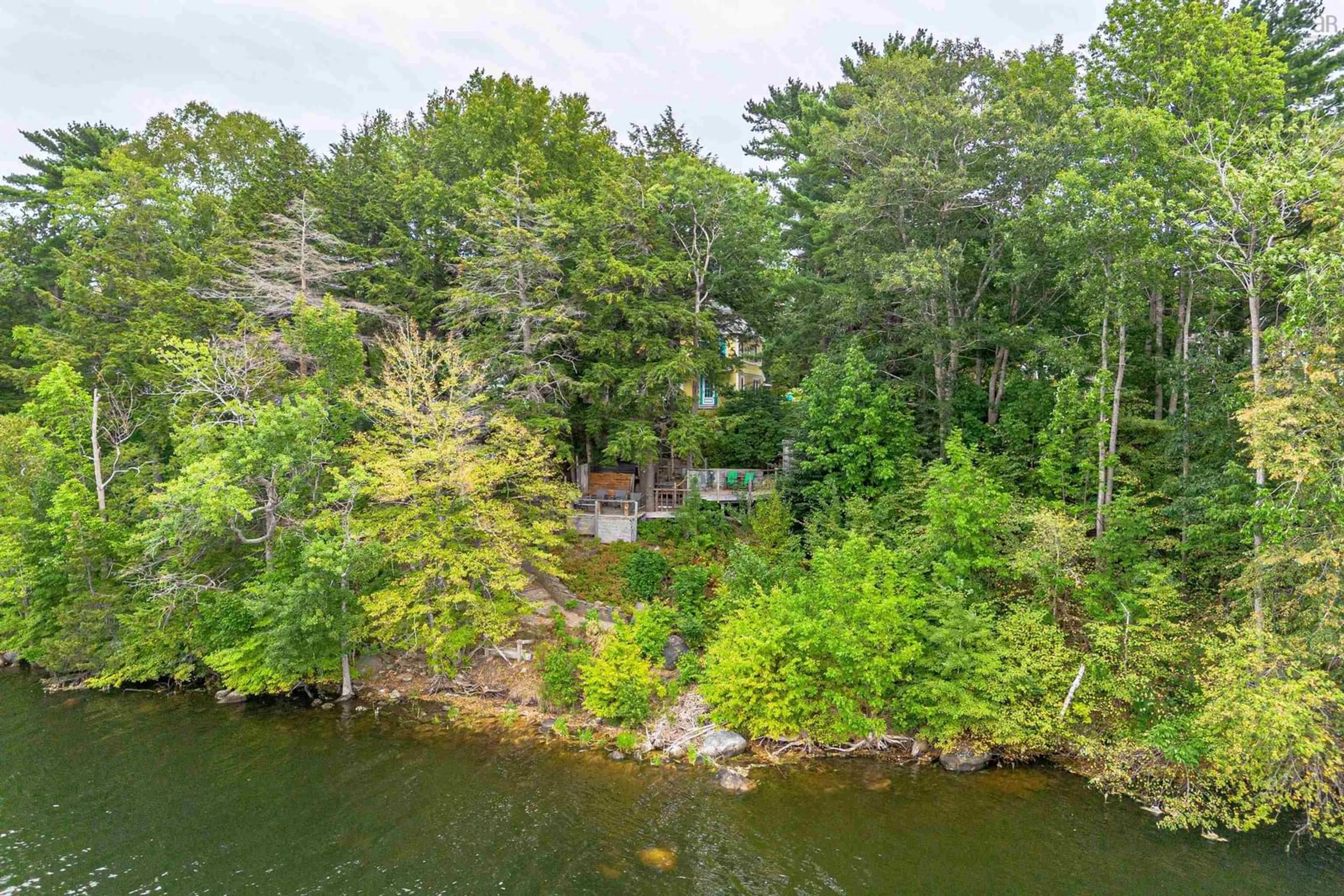 A pic from outside/outdoor area/front of a property/back of a property/a pic from drone, water/lake/river/ocean view for 78 Shore Dr, Conquerall Bank Nova Scotia B4V 0J1
