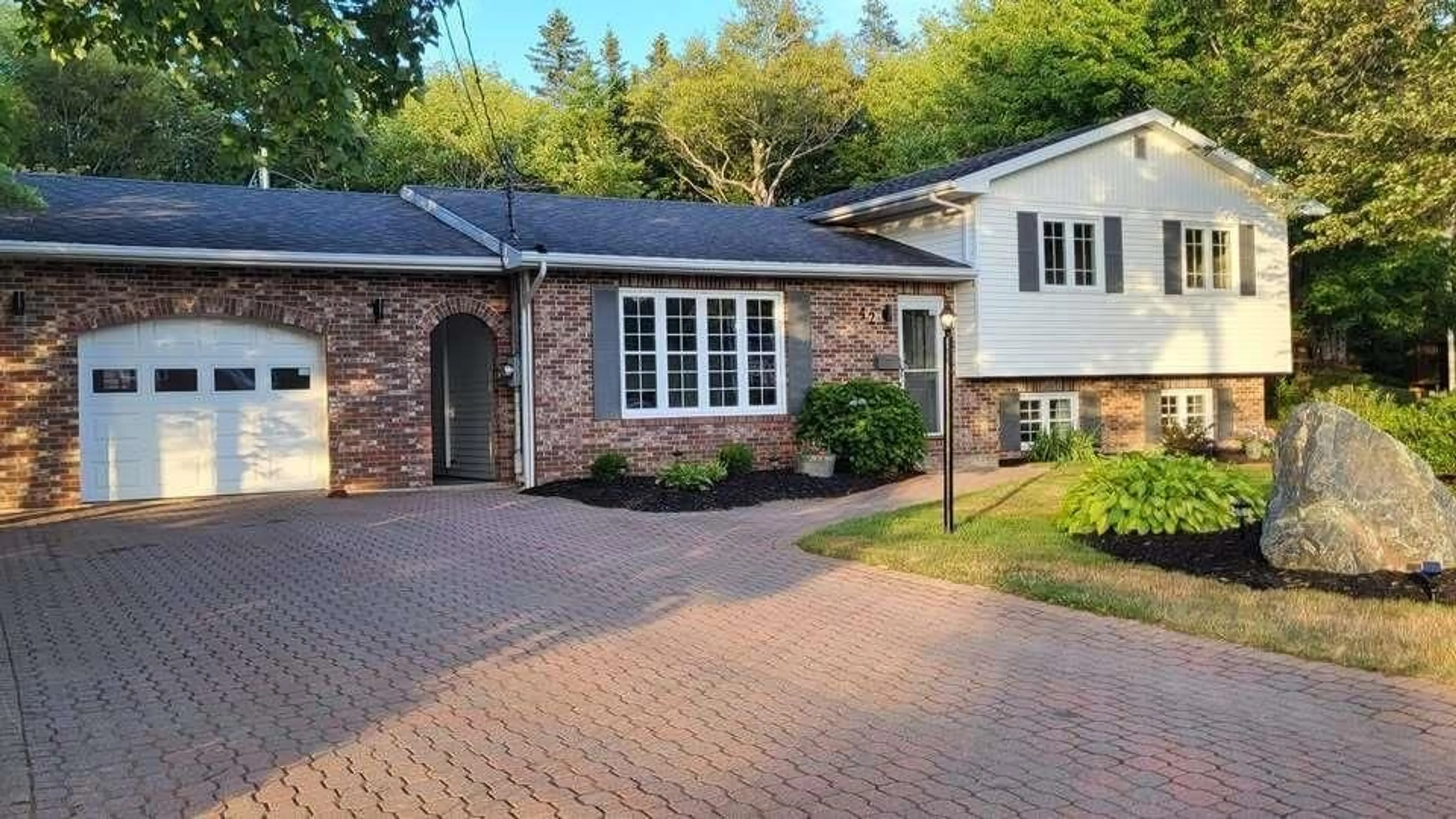 A pic from outside/outdoor area/front of a property/back of a property/a pic from drone, street for 42 Bardmoor Cres, Sydney River Nova Scotia B1S 3J6