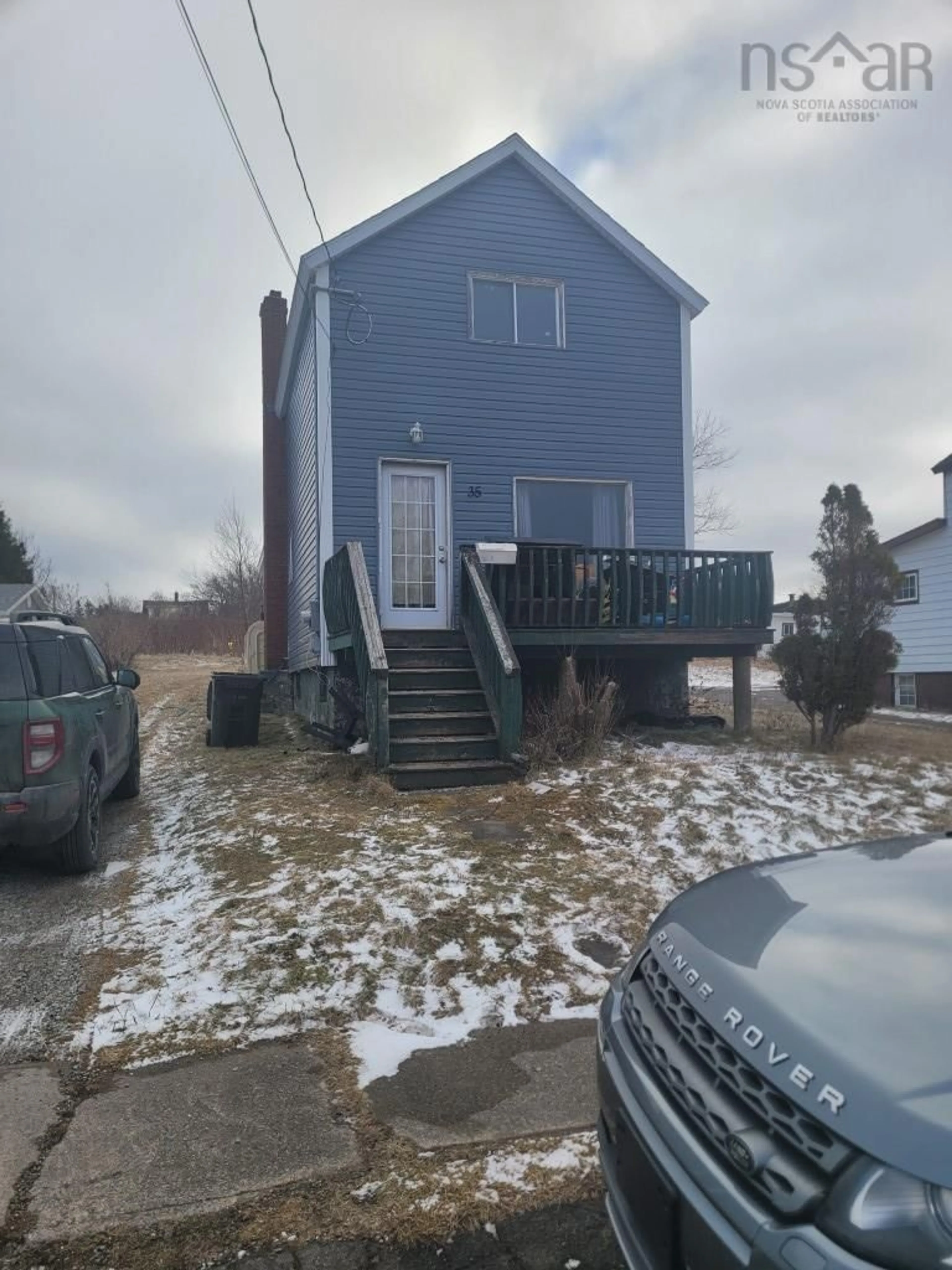 A pic from outside/outdoor area/front of a property/back of a property/a pic from drone, street for 35 School St, Glace Bay Nova Scotia B1A 5J4