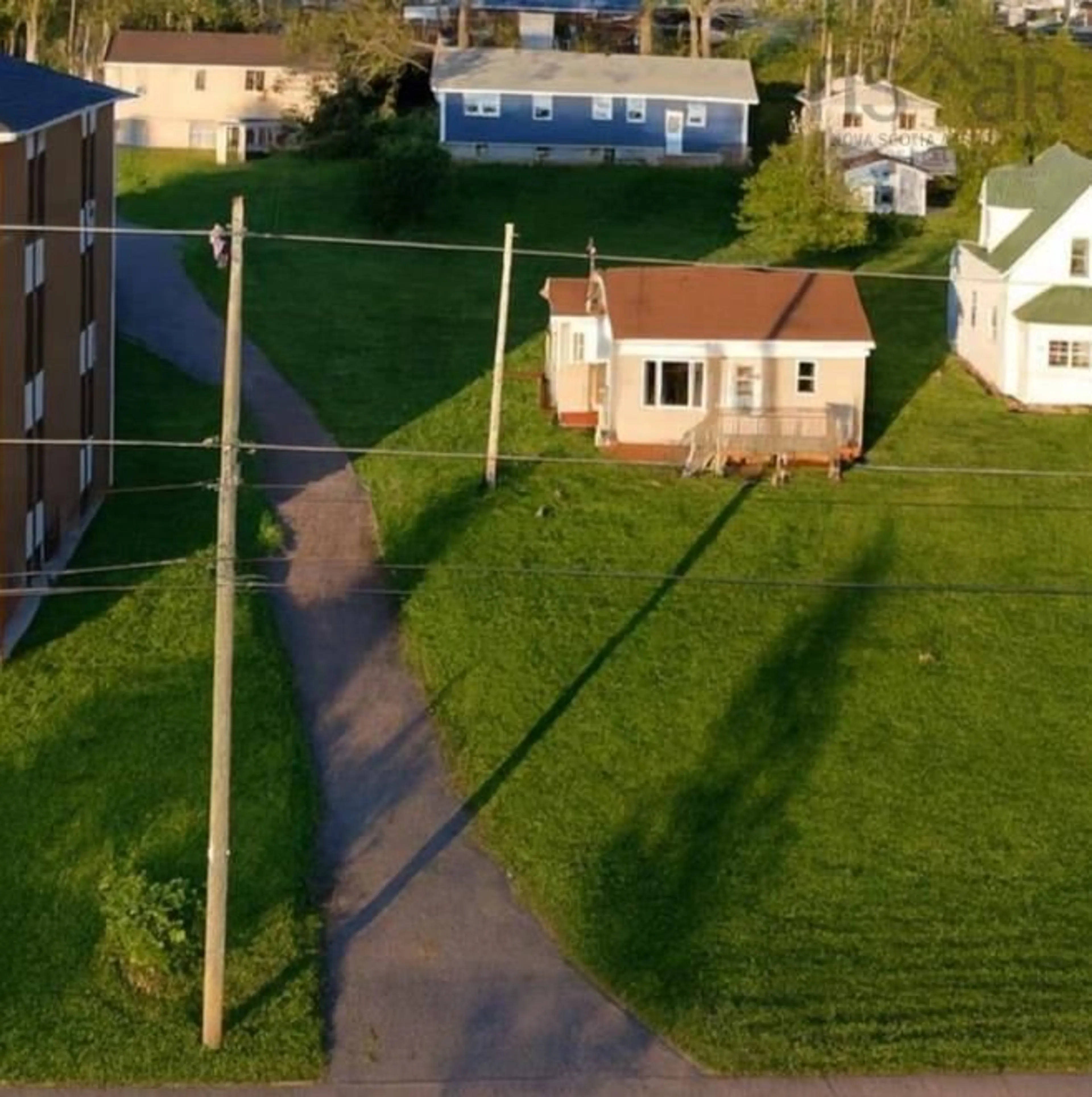 A pic from outside/outdoor area/front of a property/back of a property/a pic from drone, street for 648 Queen St, Port Hawkesbury Nova Scotia B9A 2W5