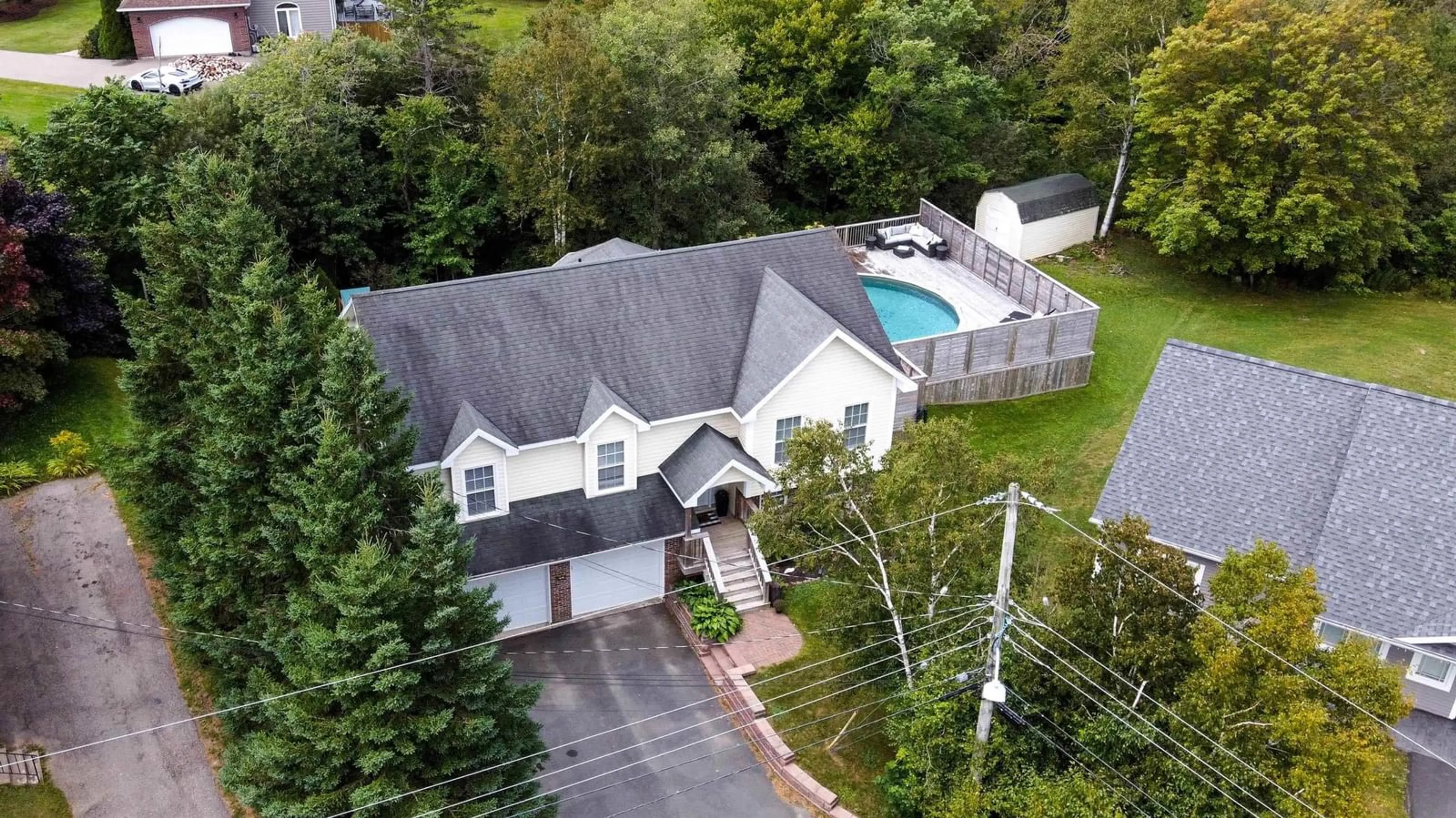 A pic from outside/outdoor area/front of a property/back of a property/a pic from drone, street for 44 Ferndell Cres, Sydney Nova Scotia B1S 3C6