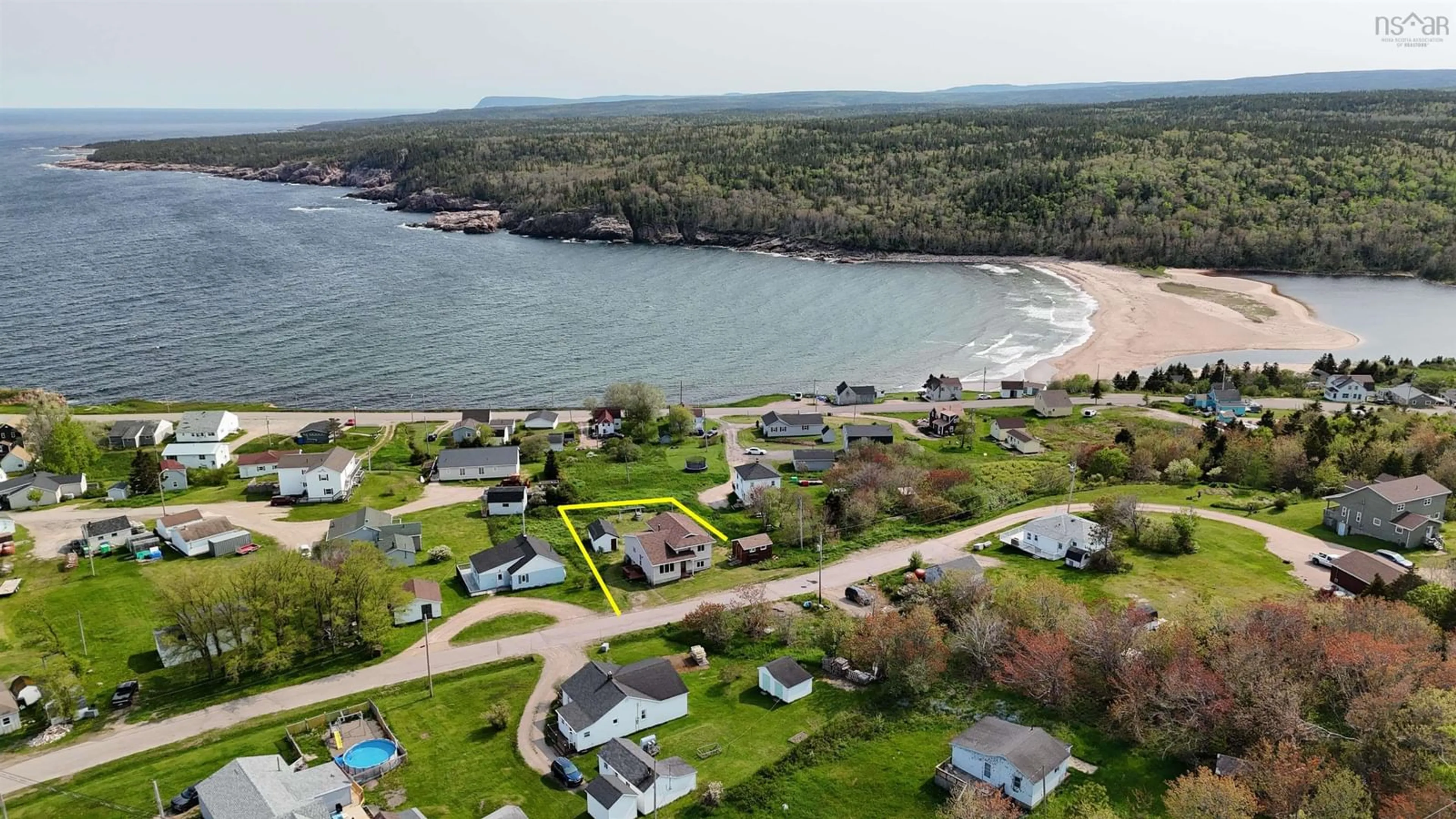 A pic from outside/outdoor area/front of a property/back of a property/a pic from drone, water/lake/river/ocean view for 17 Cyrils Dr, Neils Harbour Nova Scotia B0C 1N0