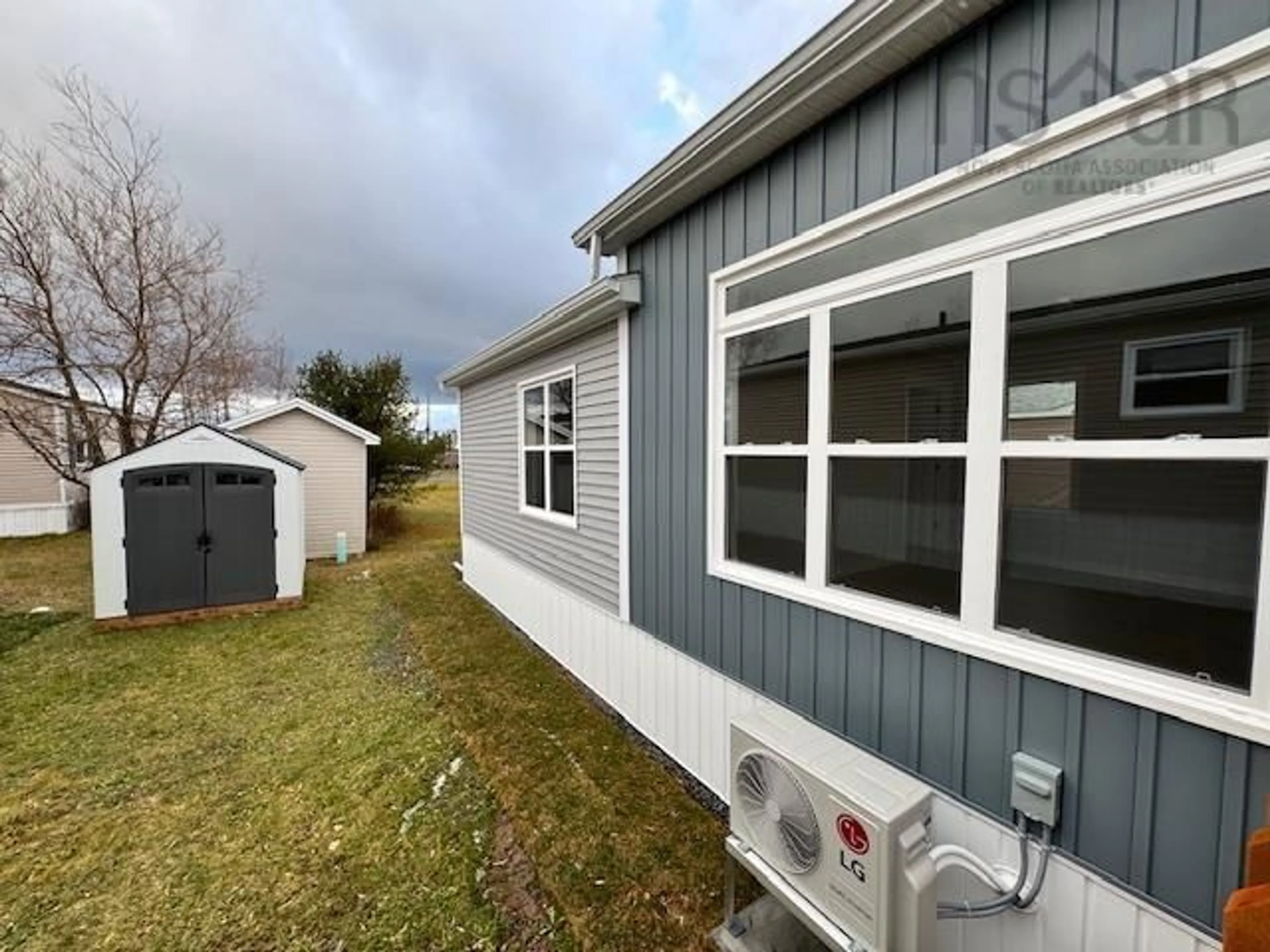 Home with vinyl exterior material, street for 4 Christopher Ave, Mount Uniacke Nova Scotia B0N 1Z0