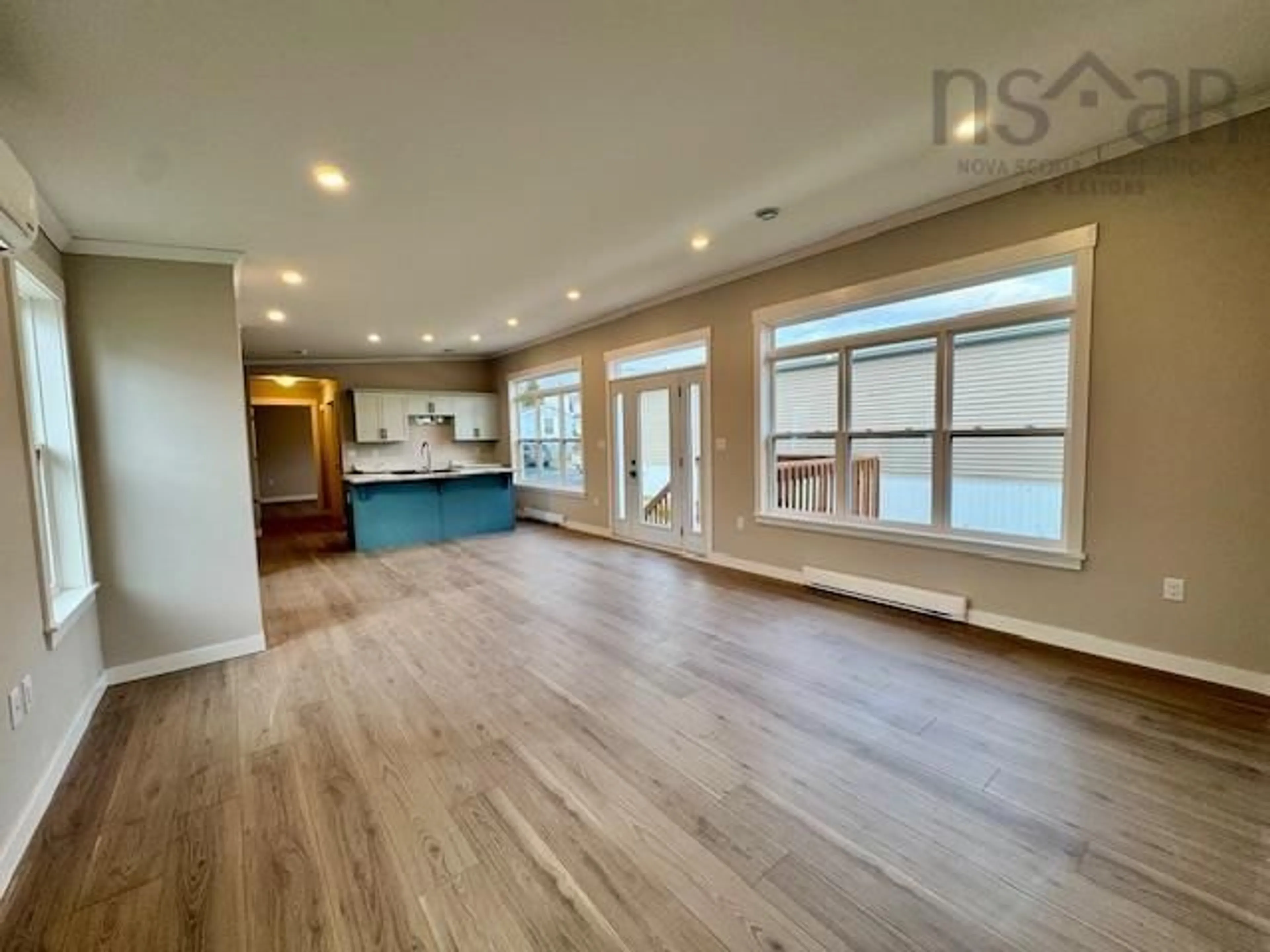 Open concept kitchen, wood/laminate floor for 4 Christopher Ave, Mount Uniacke Nova Scotia B0N 1Z0