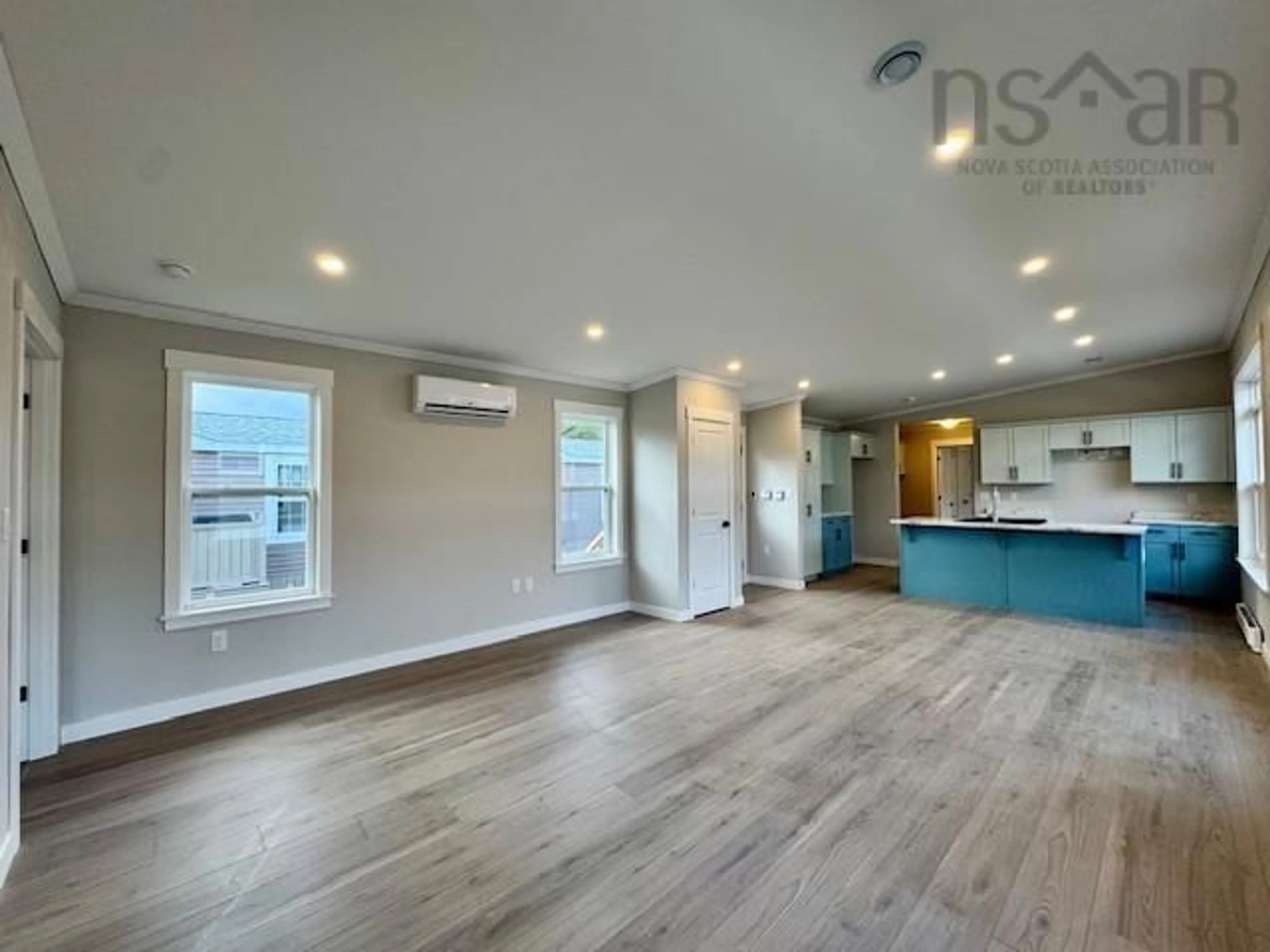 Open concept kitchen, wood/laminate floor for 4 Christopher Ave, Mount Uniacke Nova Scotia B0N 1Z0