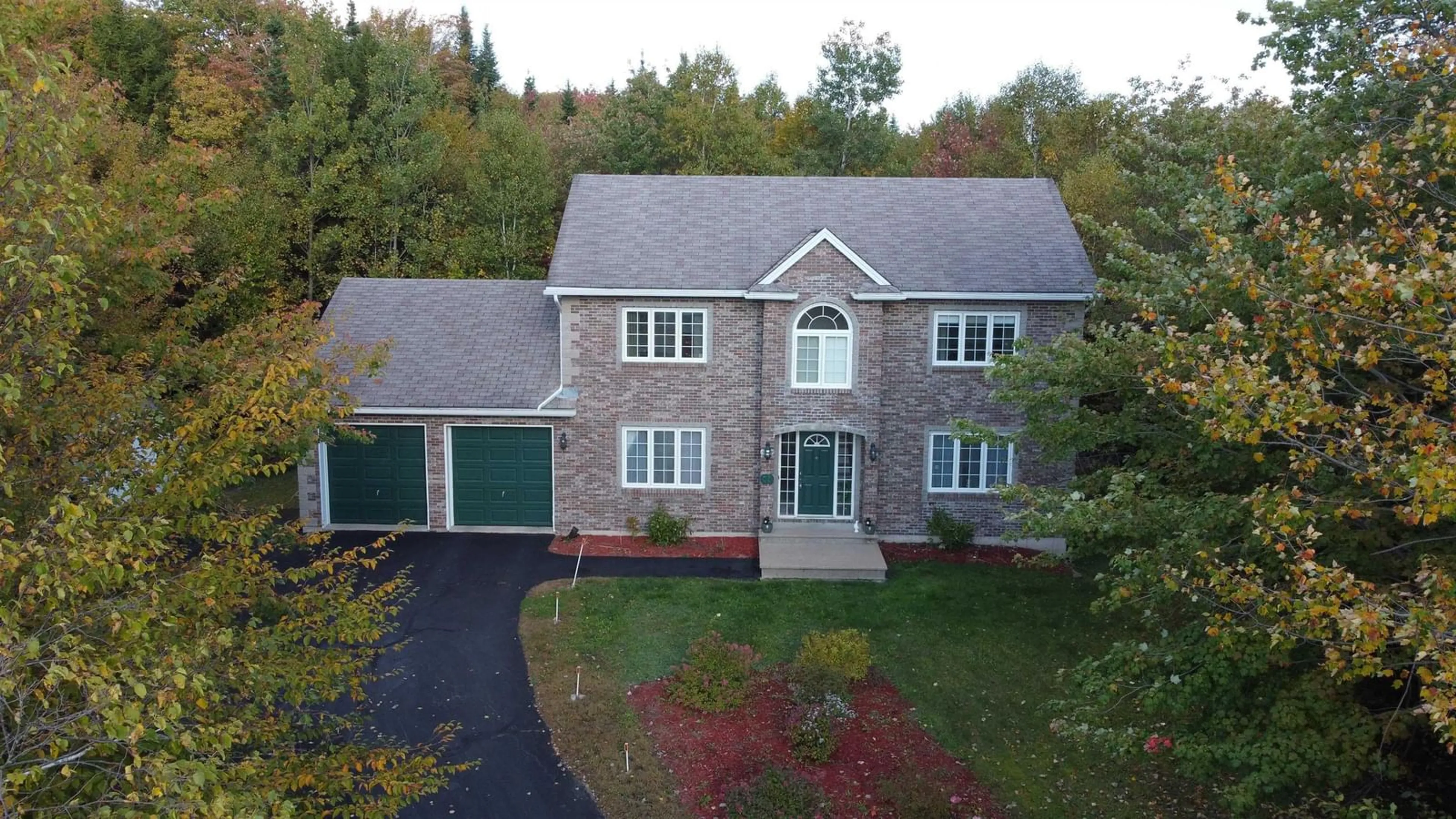 A pic from outside/outdoor area/front of a property/back of a property/a pic from drone, street for 15 Kara Crt, Hammonds Plains Nova Scotia B4B 1L4