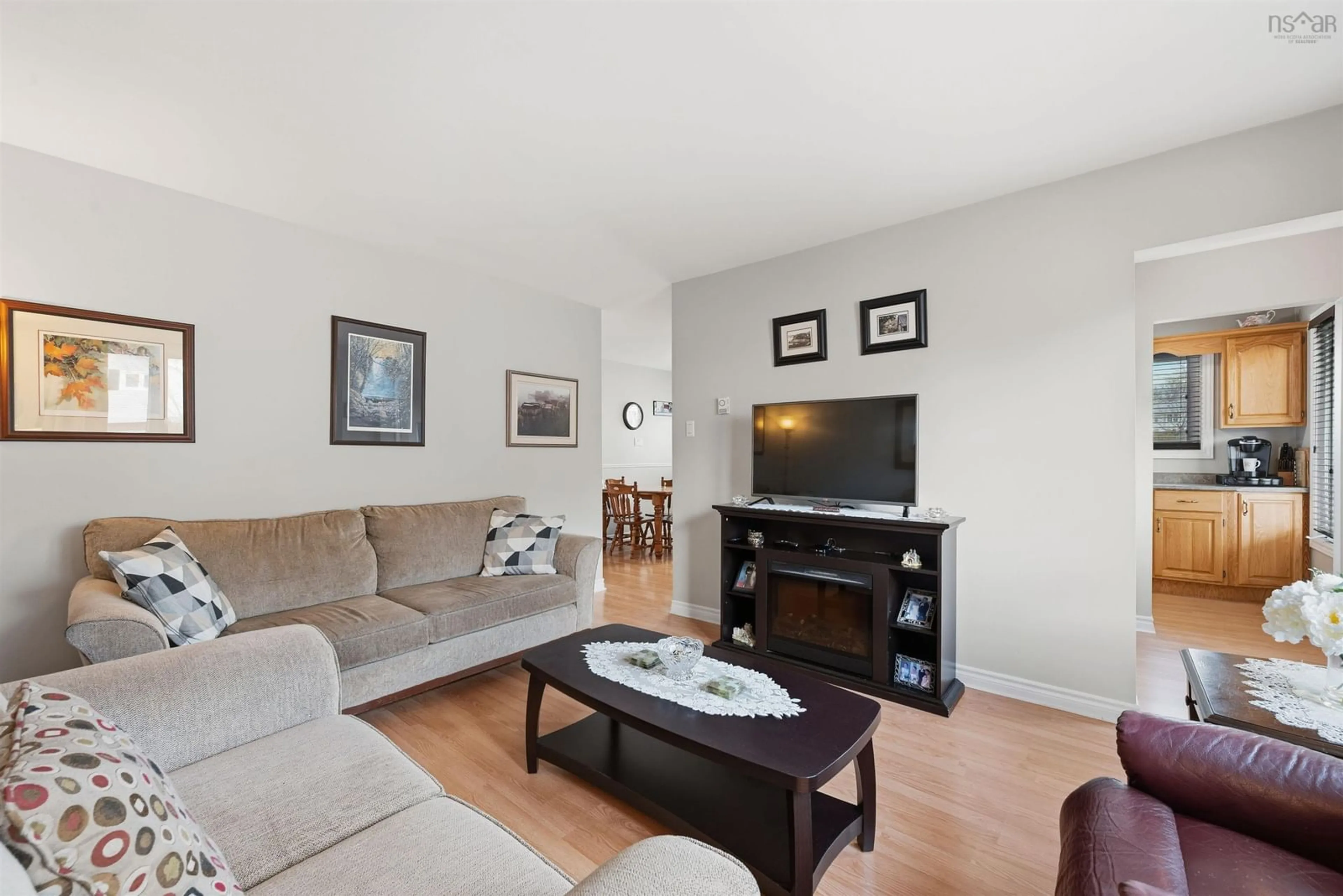 Living room with furniture, wood/laminate floor for 54 Quaker Cres, Lower Sackville Nova Scotia B4C 2Z4