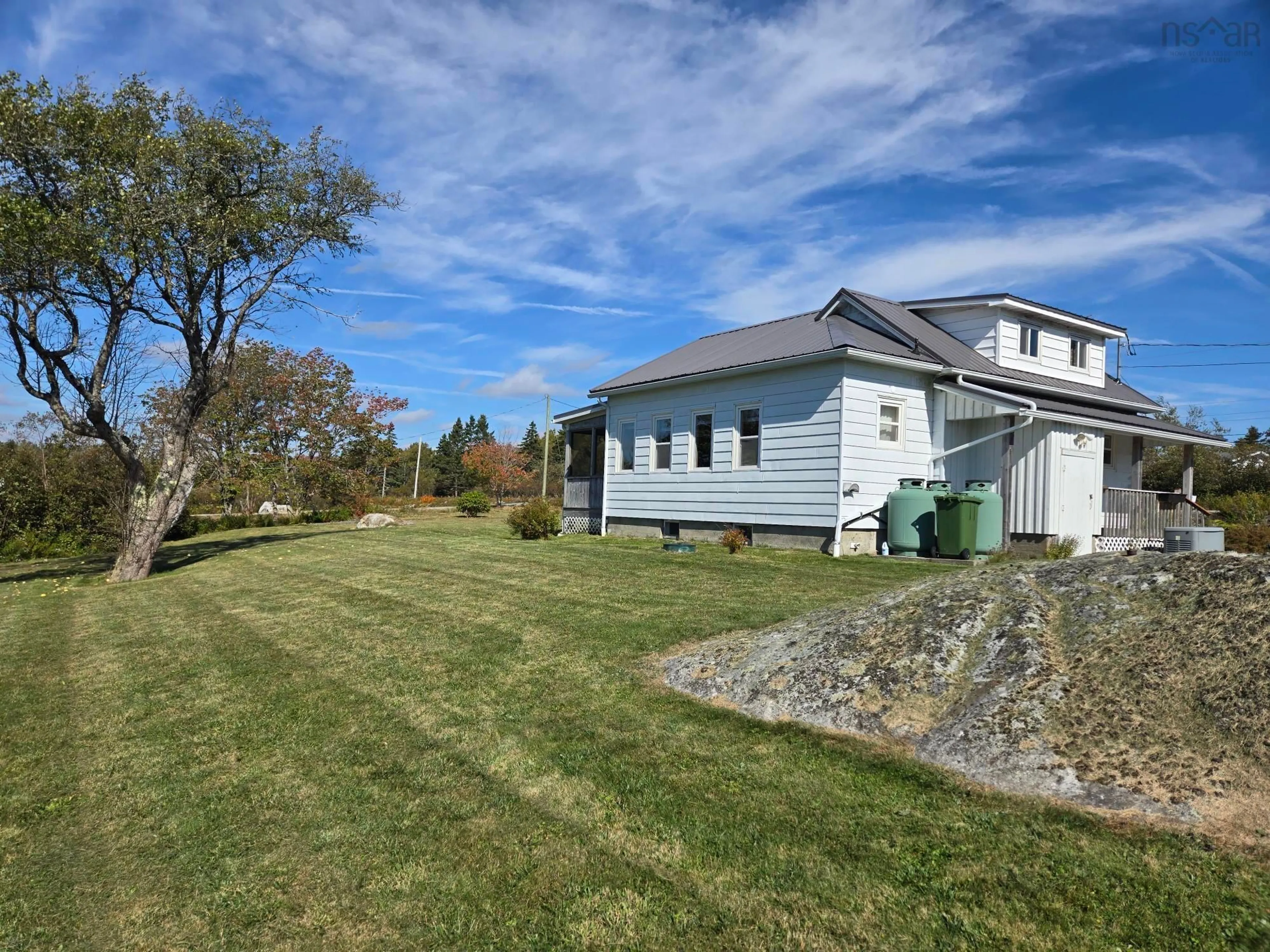 A pic from outside/outdoor area/front of a property/back of a property/a pic from drone, water/lake/river/ocean view for 2053 Eastern Shore Rd, West Berlin Nova Scotia B0J 1H0
