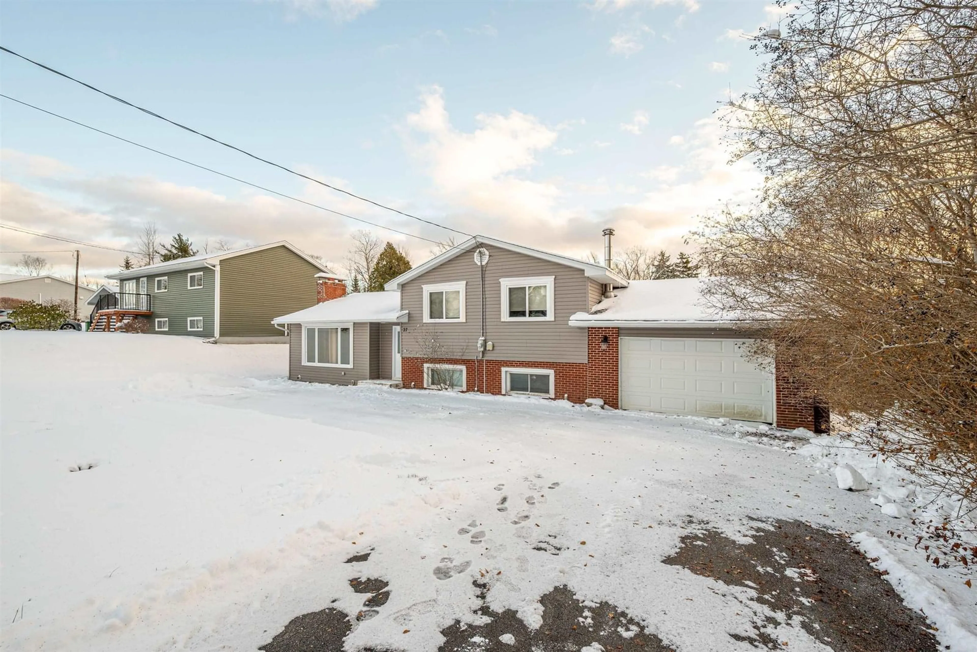 A pic from outside/outdoor area/front of a property/back of a property/a pic from drone, street for 27 Grove Ave, Beaver Bank Nova Scotia B4G 1B7