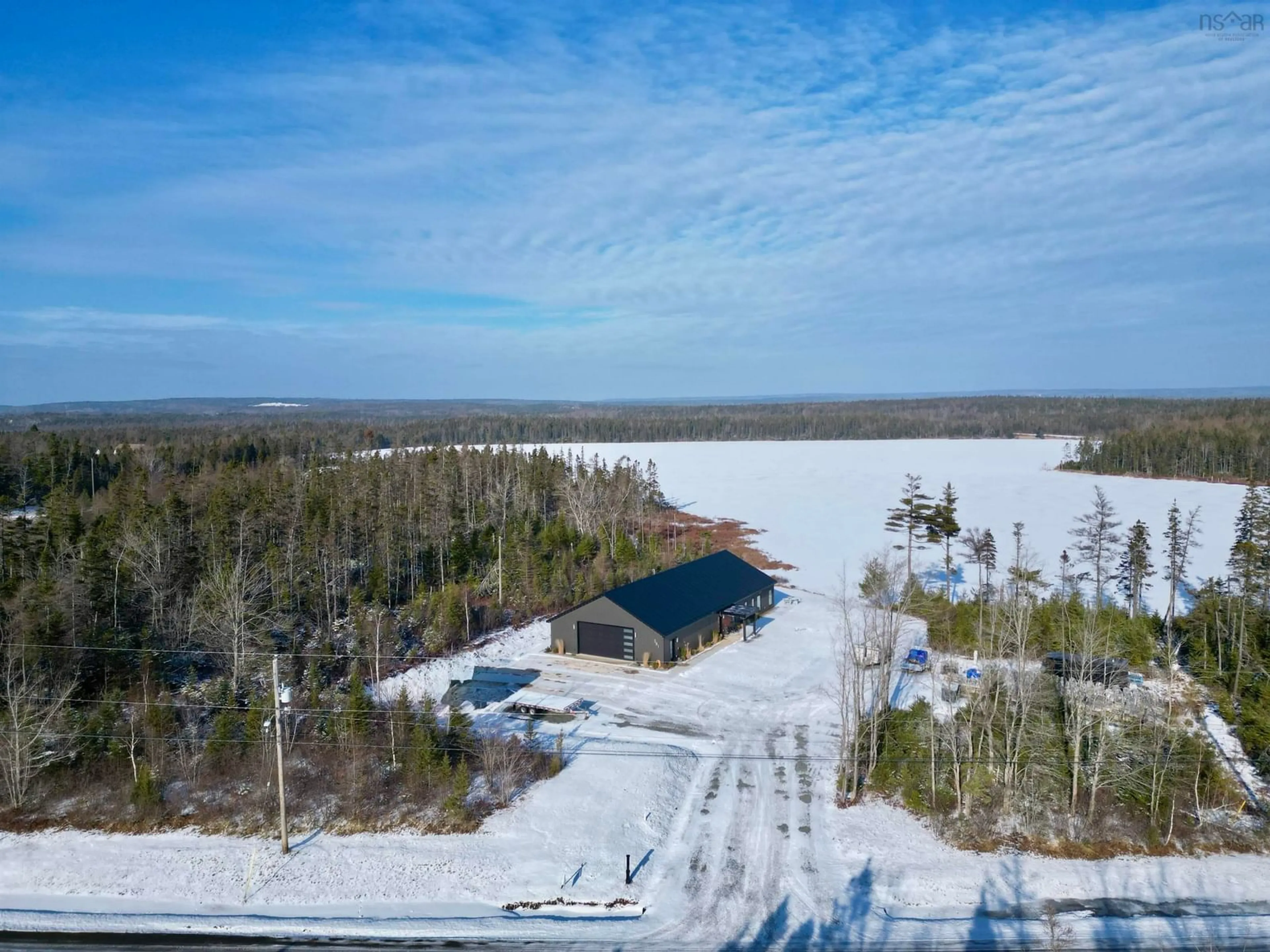 A pic from outside/outdoor area/front of a property/back of a property/a pic from drone, water/lake/river/ocean view for 381 Grandiqe Ferry Rd., Louisdale Nova Scotia B0E 1V0