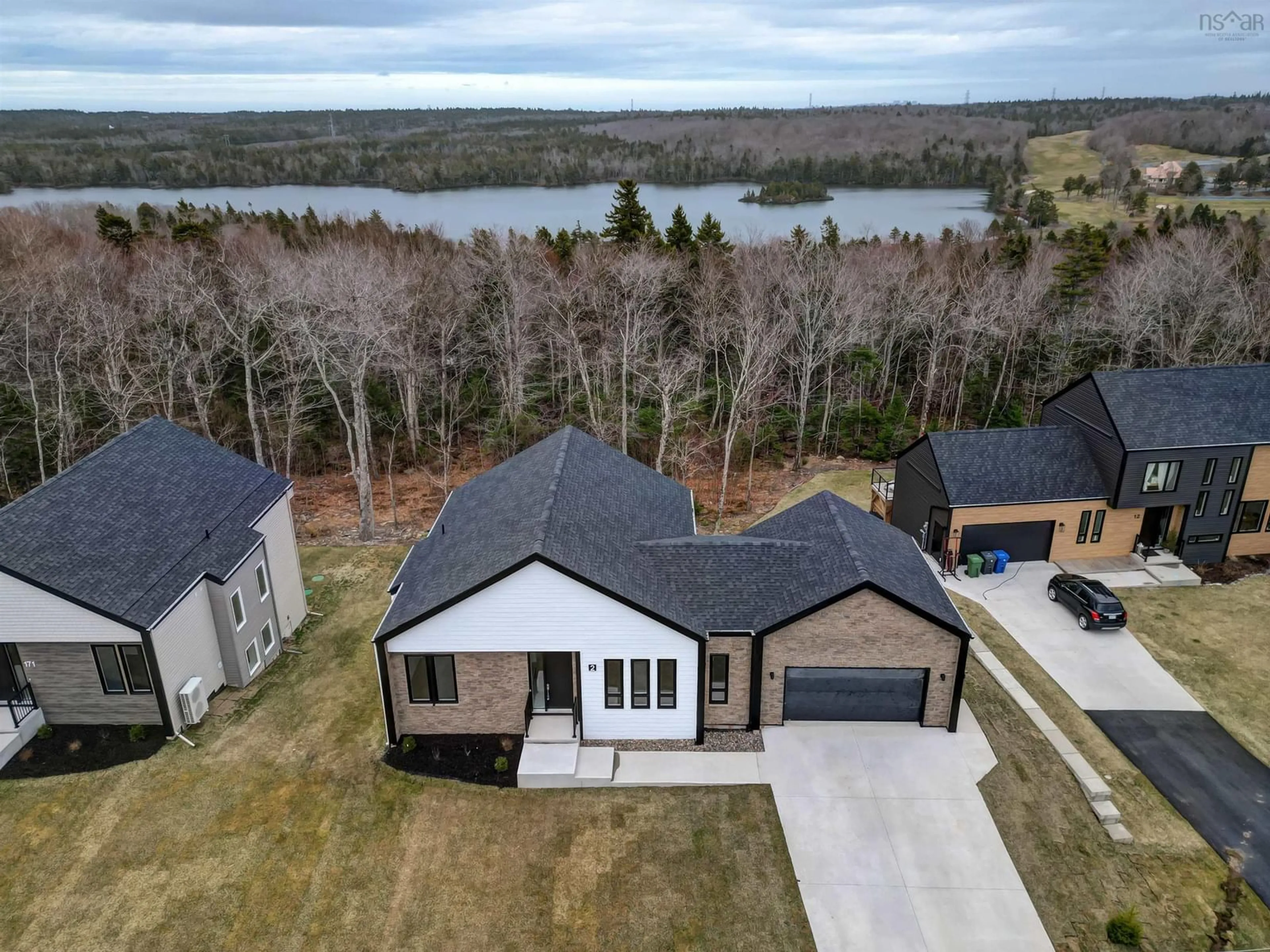 A pic from outside/outdoor area/front of a property/back of a property/a pic from drone, water/lake/river/ocean view for 2 Merion Crt, Hammonds Plains Nova Scotia B4B 2R1