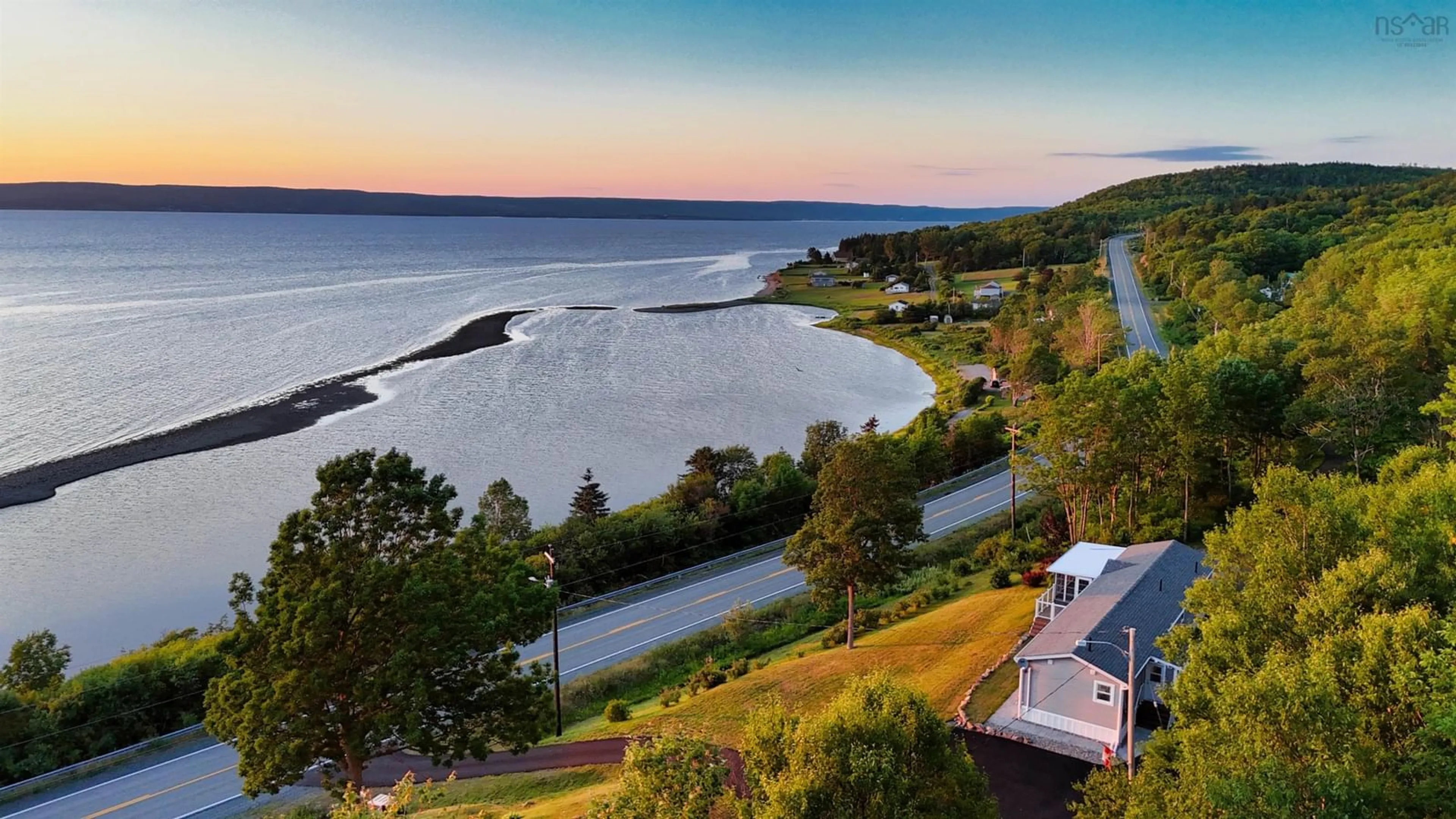 A pic from outside/outdoor area/front of a property/back of a property/a pic from drone, water/lake/river/ocean view for 9653 East Bay Hwy, Irishvale Nova Scotia B1J 2B3