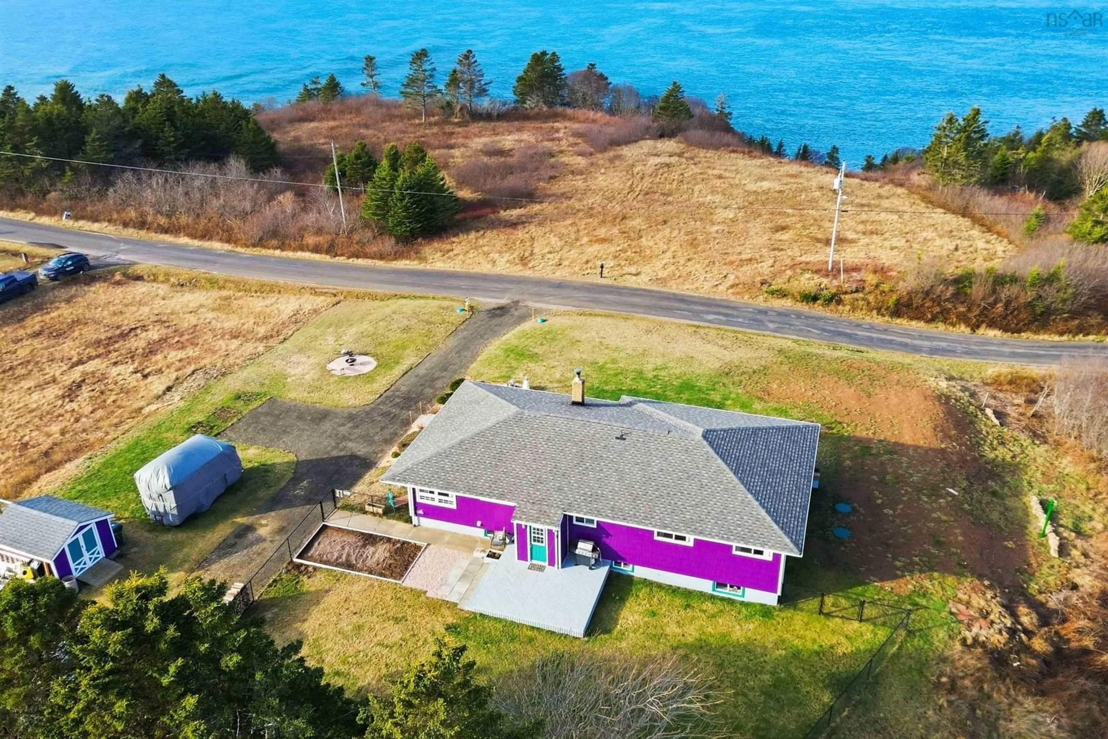 A pic from outside/outdoor area/front of a property/back of a property/a pic from drone, water/lake/river/ocean view for 93 Across The Meadow Rd, East Ferry Nova Scotia B0V 1E0