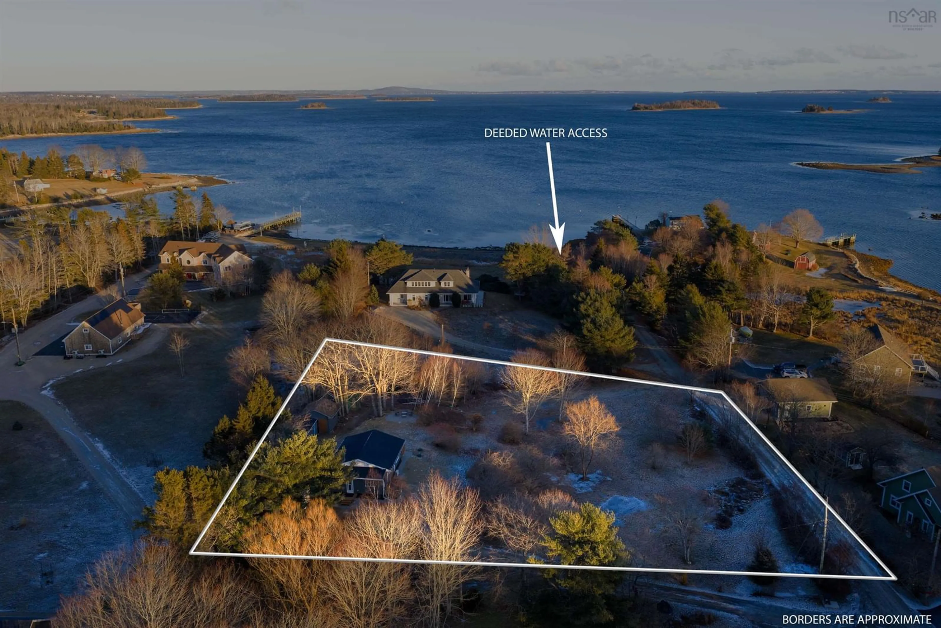 A pic from outside/outdoor area/front of a property/back of a property/a pic from drone, water/lake/river/ocean view for 121 Barkhouse Rd, Martins Point Nova Scotia B0J 2E0