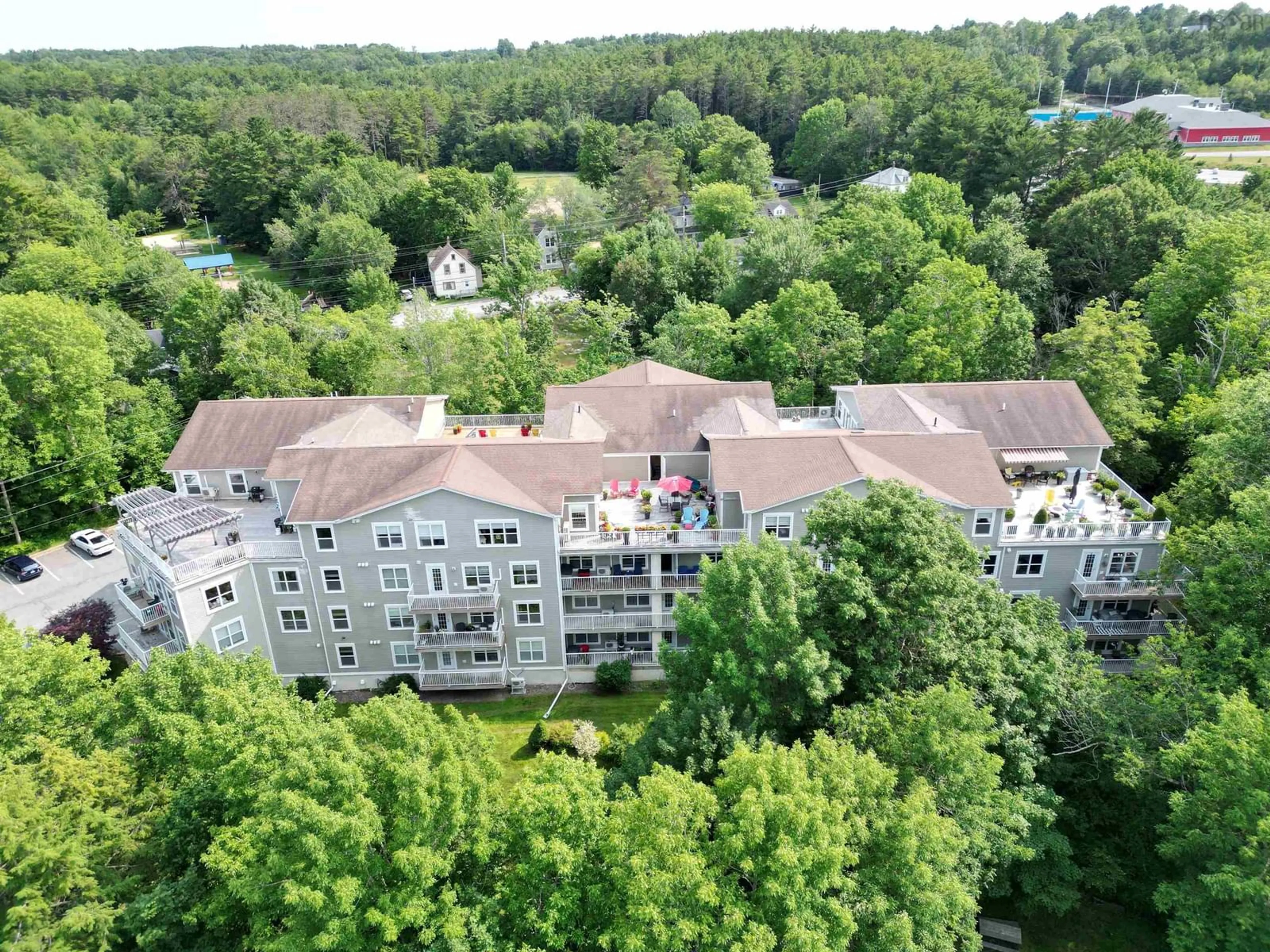 A pic from outside/outdoor area/front of a property/back of a property/a pic from drone, city buildings view from balcony for 476 Main St #302, Mahone Bay Nova Scotia B0J 2E0