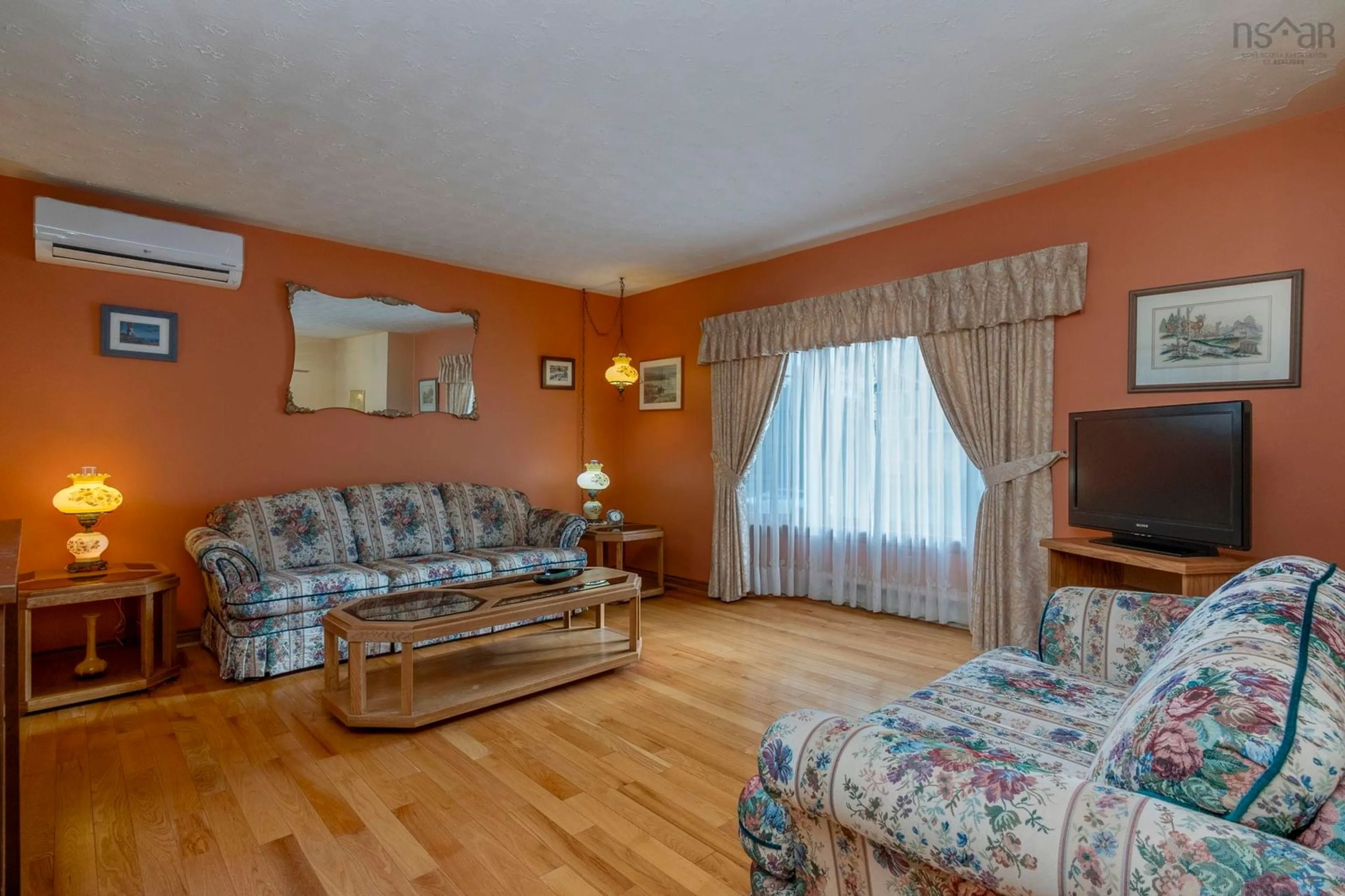 Living room with furniture, wood/laminate floor for 13 P Thomas Dr, Woodlawn Nova Scotia B2W 6A1
