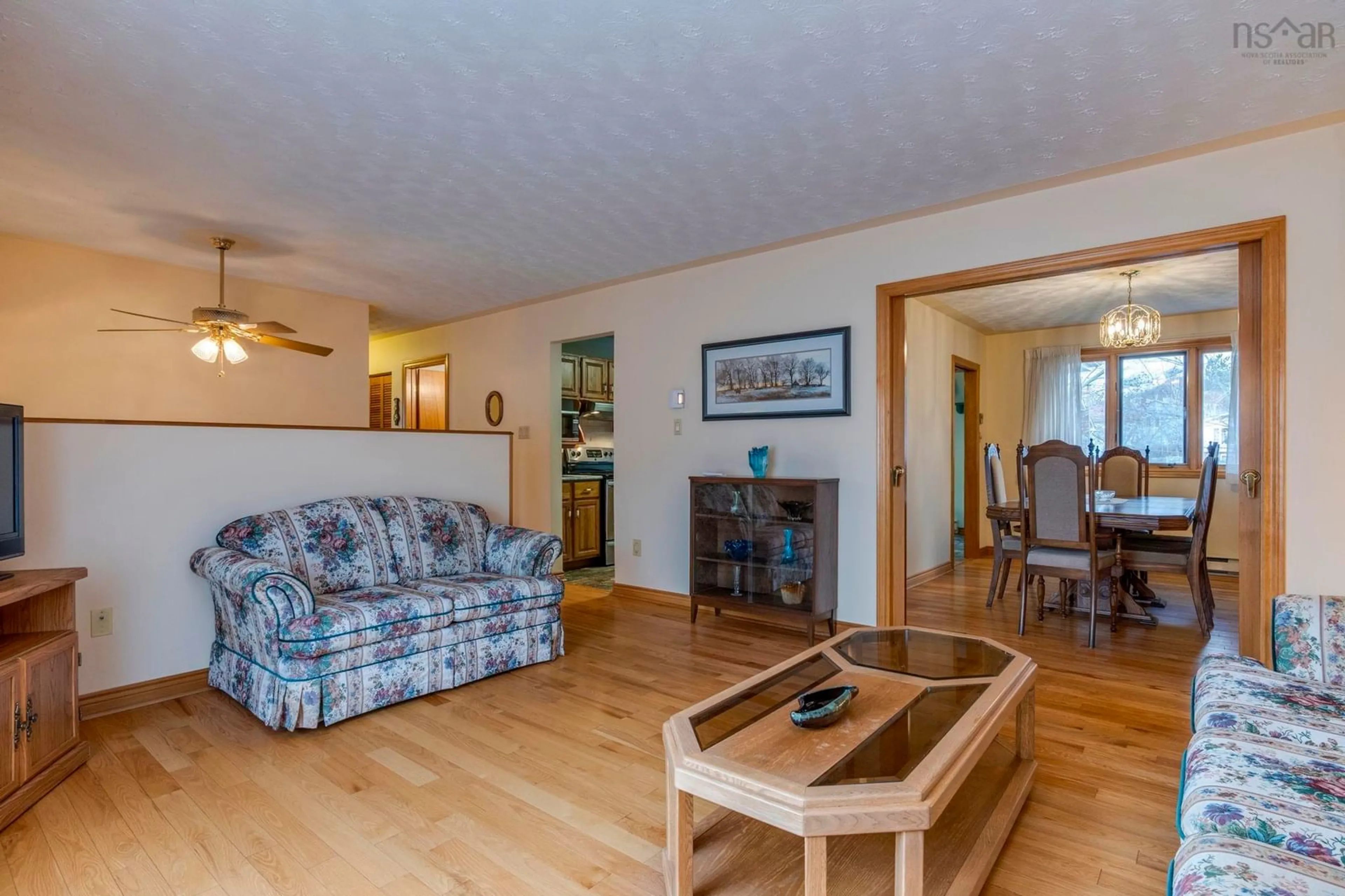 Living room with furniture, wood/laminate floor for 13 P Thomas Dr, Woodlawn Nova Scotia B2W 6A1