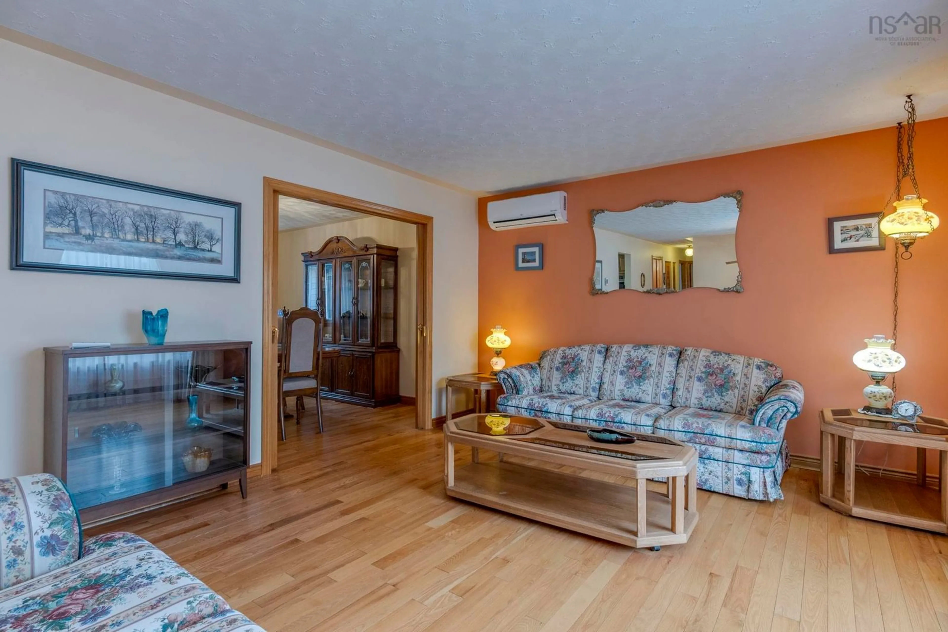 Living room with furniture, wood/laminate floor for 13 P Thomas Dr, Woodlawn Nova Scotia B2W 6A1