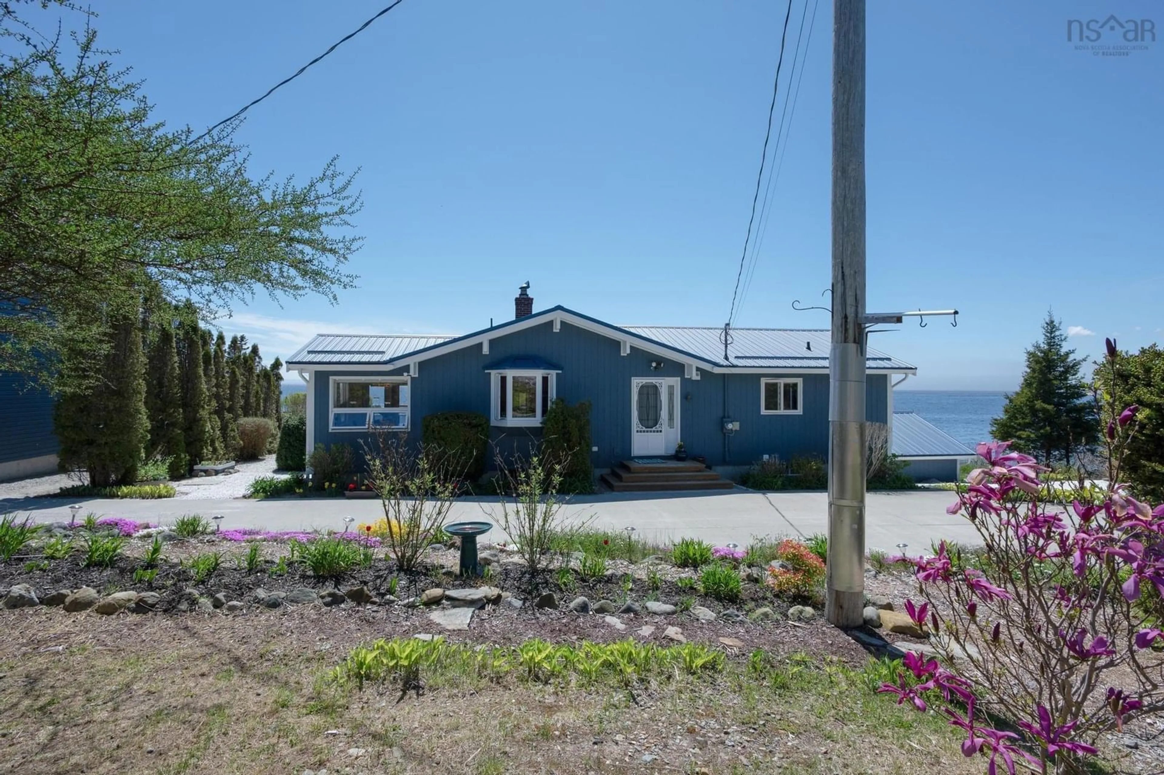 Home with vinyl exterior material, water/lake/river/ocean view for 1904 Sandy Point Rd, Sandy Point Nova Scotia B0T 1W0