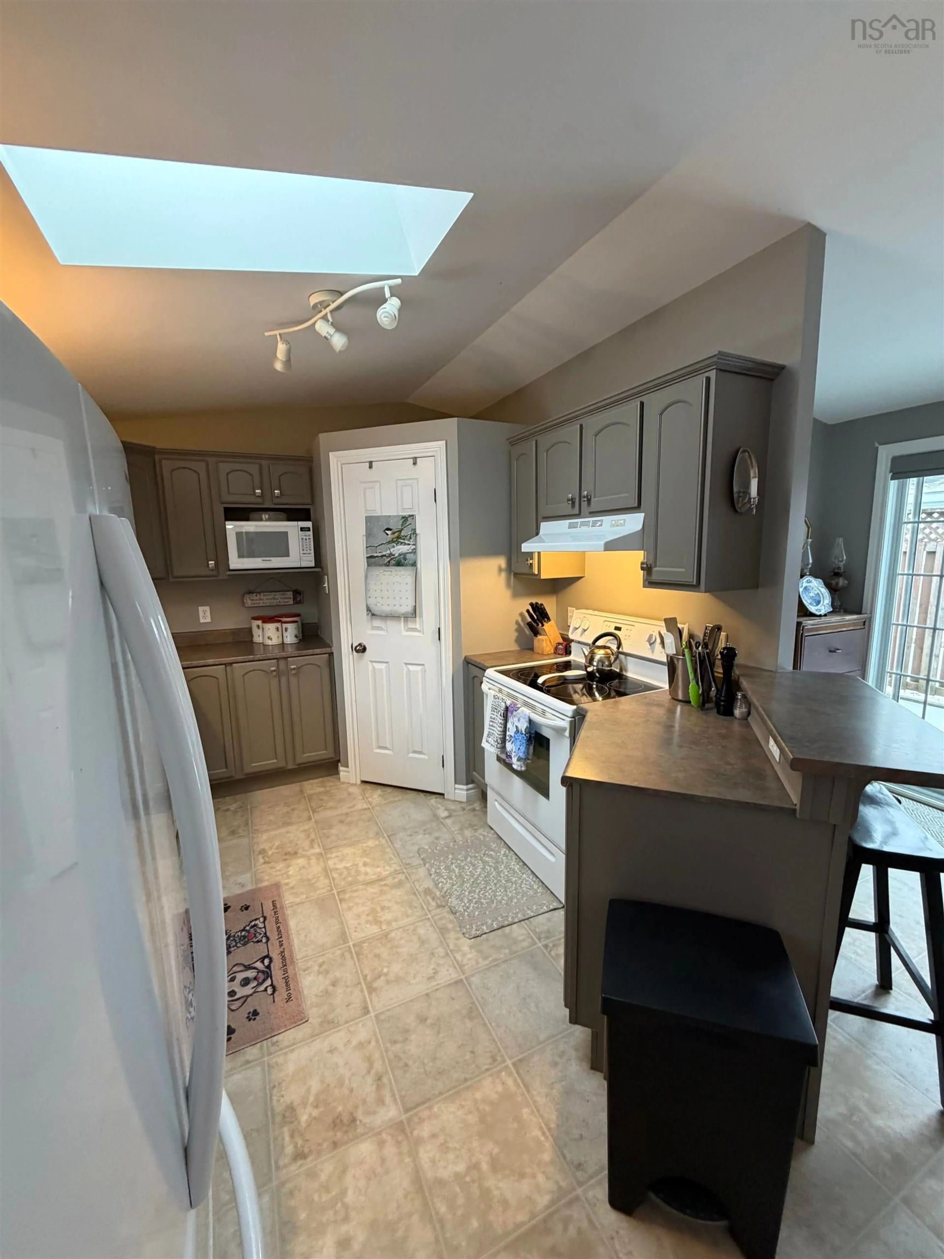 Open concept kitchen, ceramic/tile floor for 2 South Hill Drive, Antigonish Nova Scotia B2G 2V9