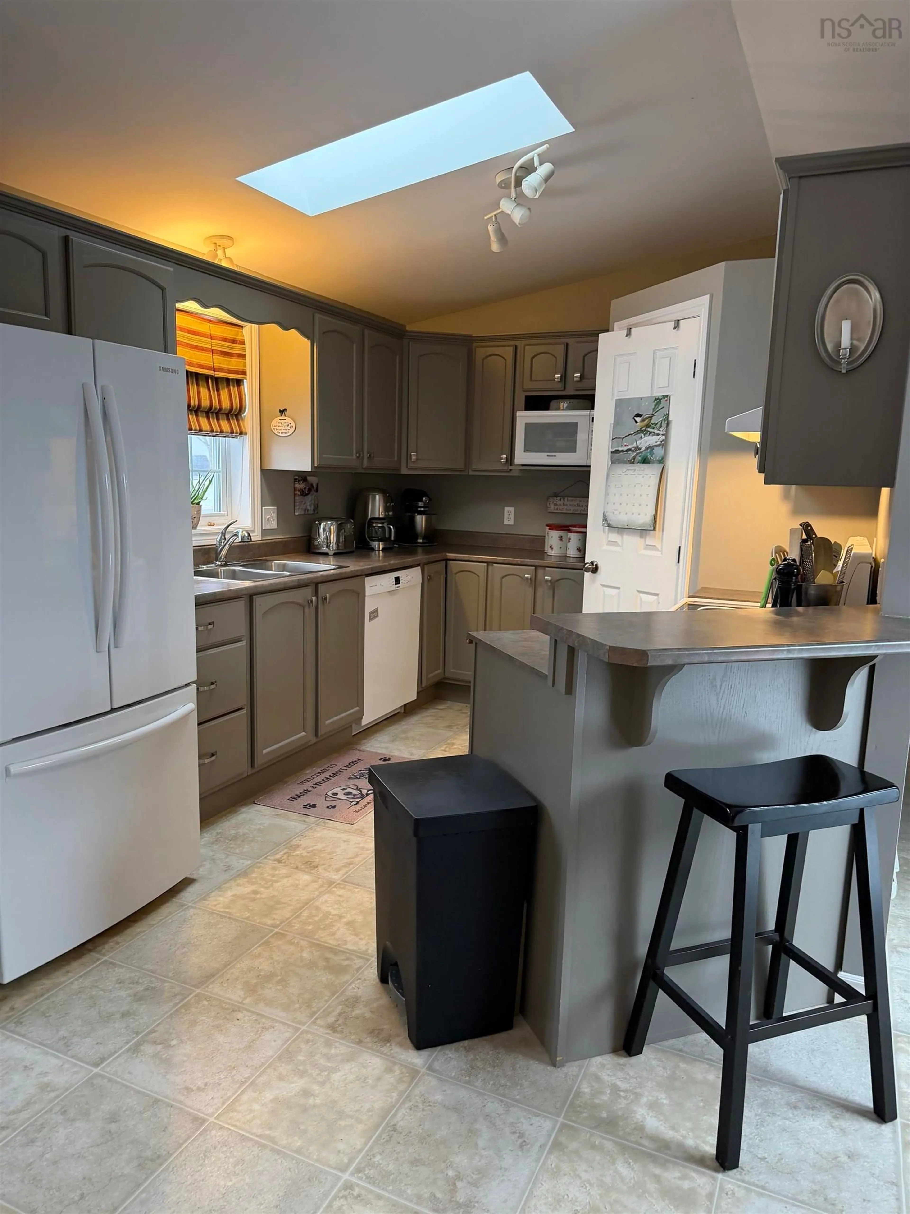 Open concept kitchen, ceramic/tile floor for 2 South Hill Drive, Antigonish Nova Scotia B2G 2V9