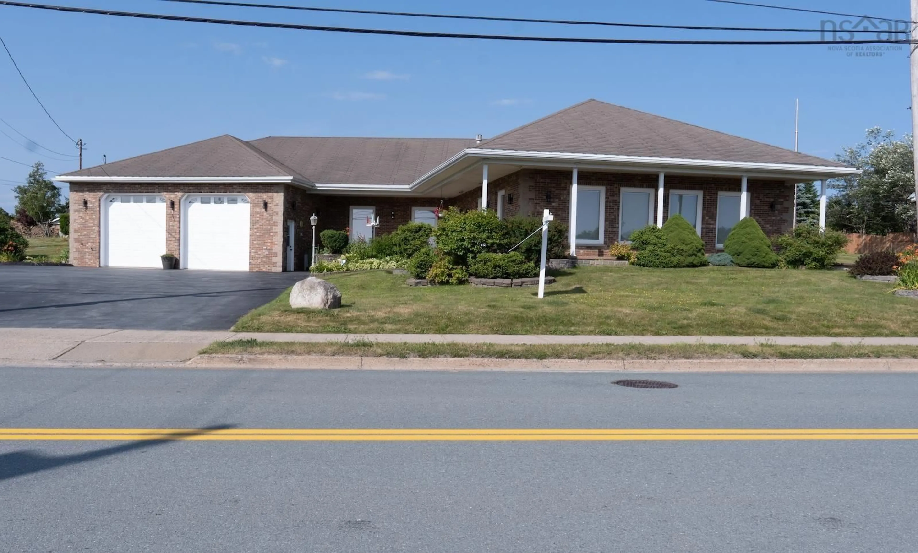 Home with brick exterior material, street for 1638 Shore Rd, Eastern Passage Nova Scotia B3G 1G3