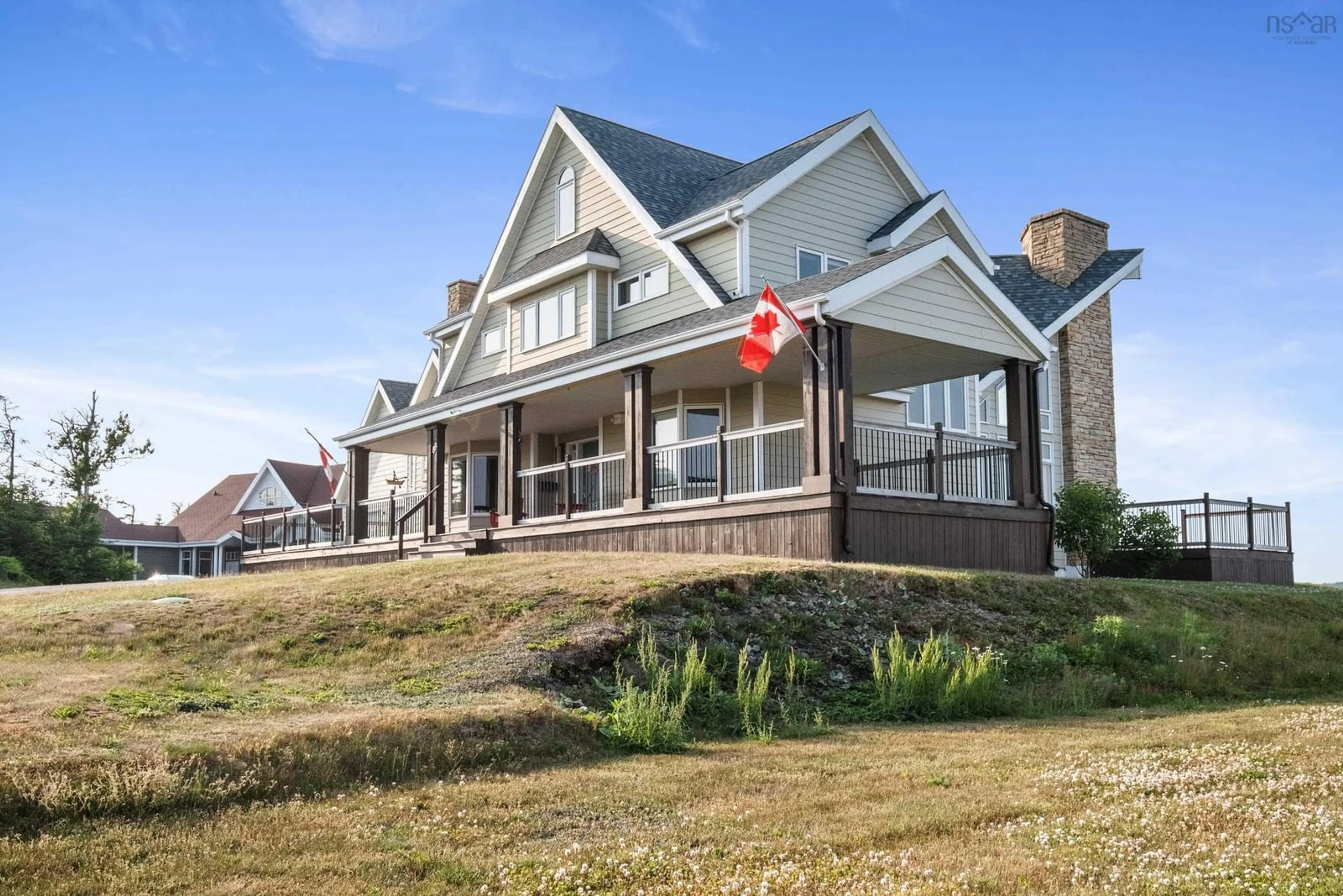 A pic from outside/outdoor area/front of a property/back of a property/a pic from drone, unknown for 89 Bastion Ave, Louisbourg Nova Scotia B1C 0A1