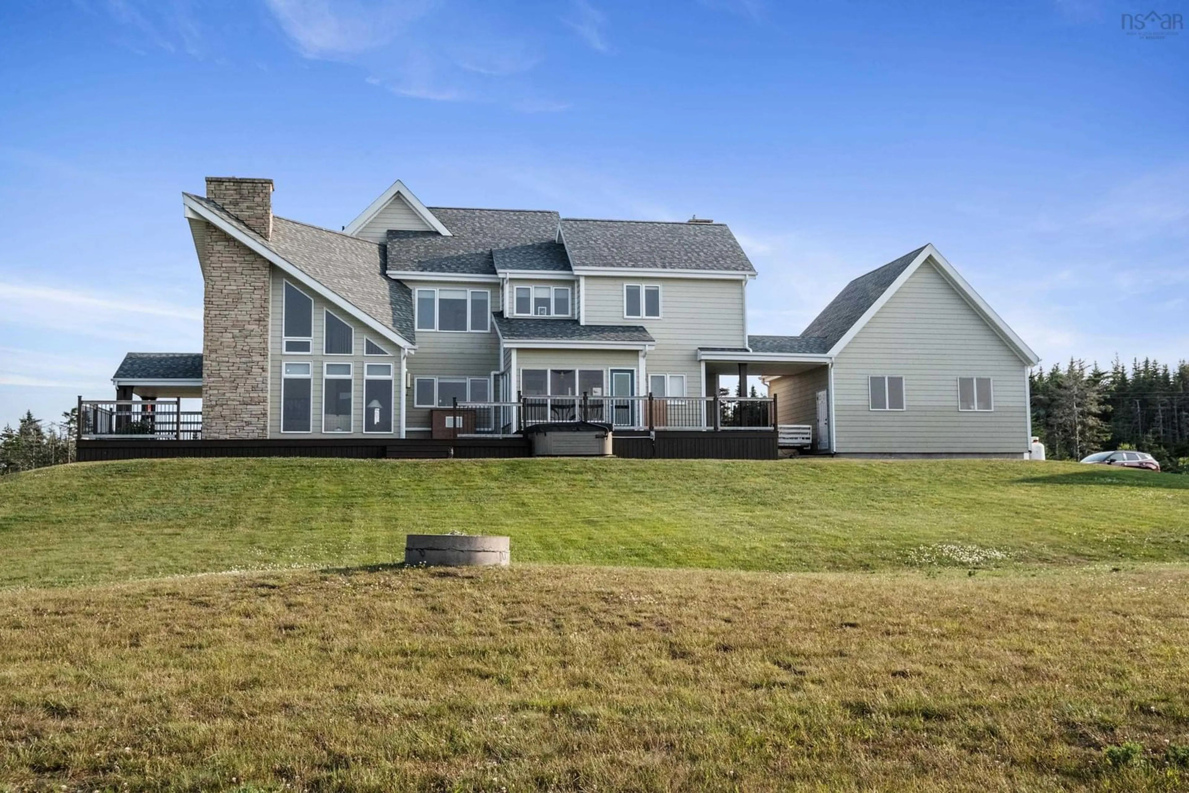 A pic from outside/outdoor area/front of a property/back of a property/a pic from drone, unknown for 89 Bastion Ave, Louisbourg Nova Scotia B1C 0A1