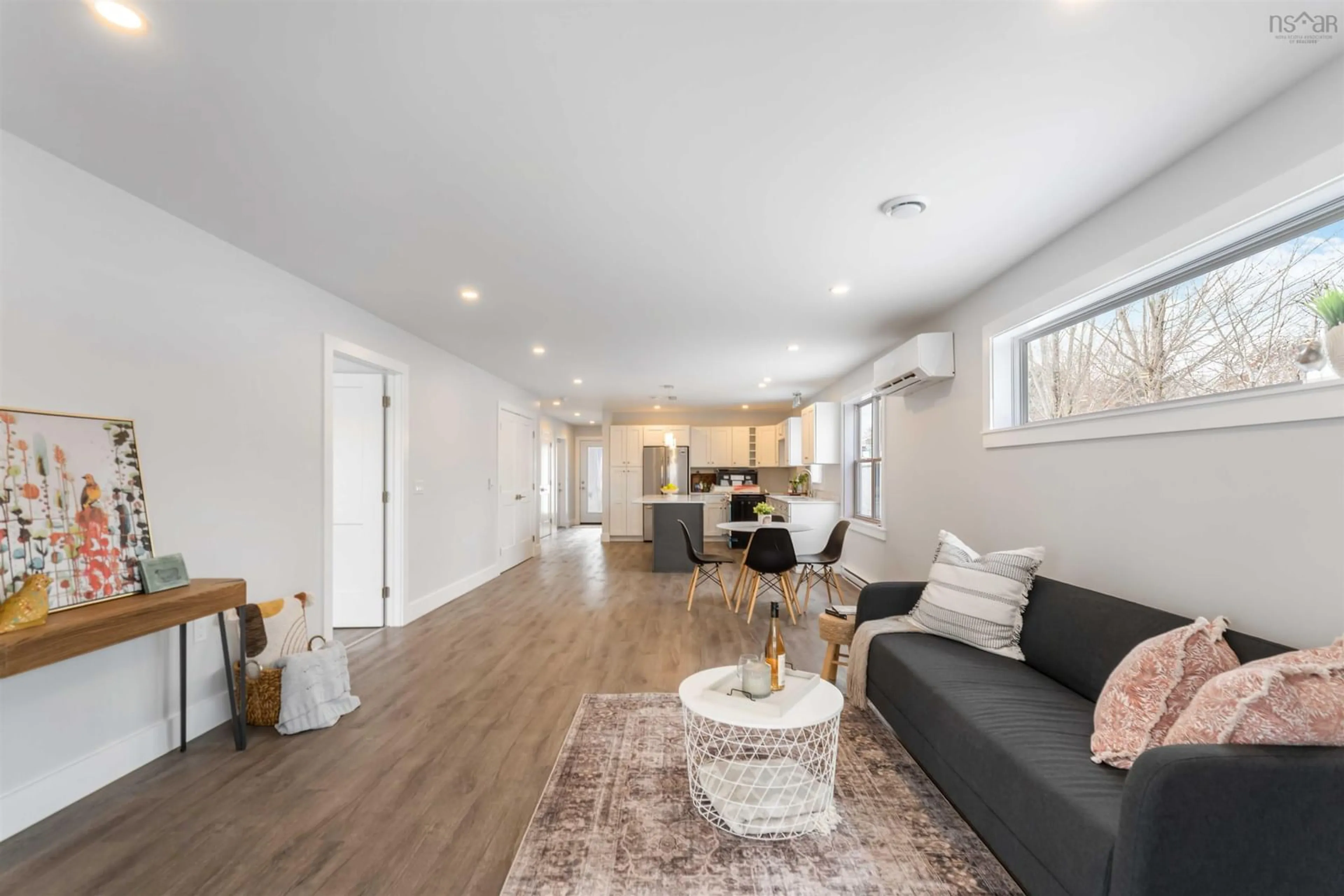 Living room with furniture, wood/laminate floor for 38 Pemberton Avenue, Garlands Crossing Nova Scotia B0N 2T0