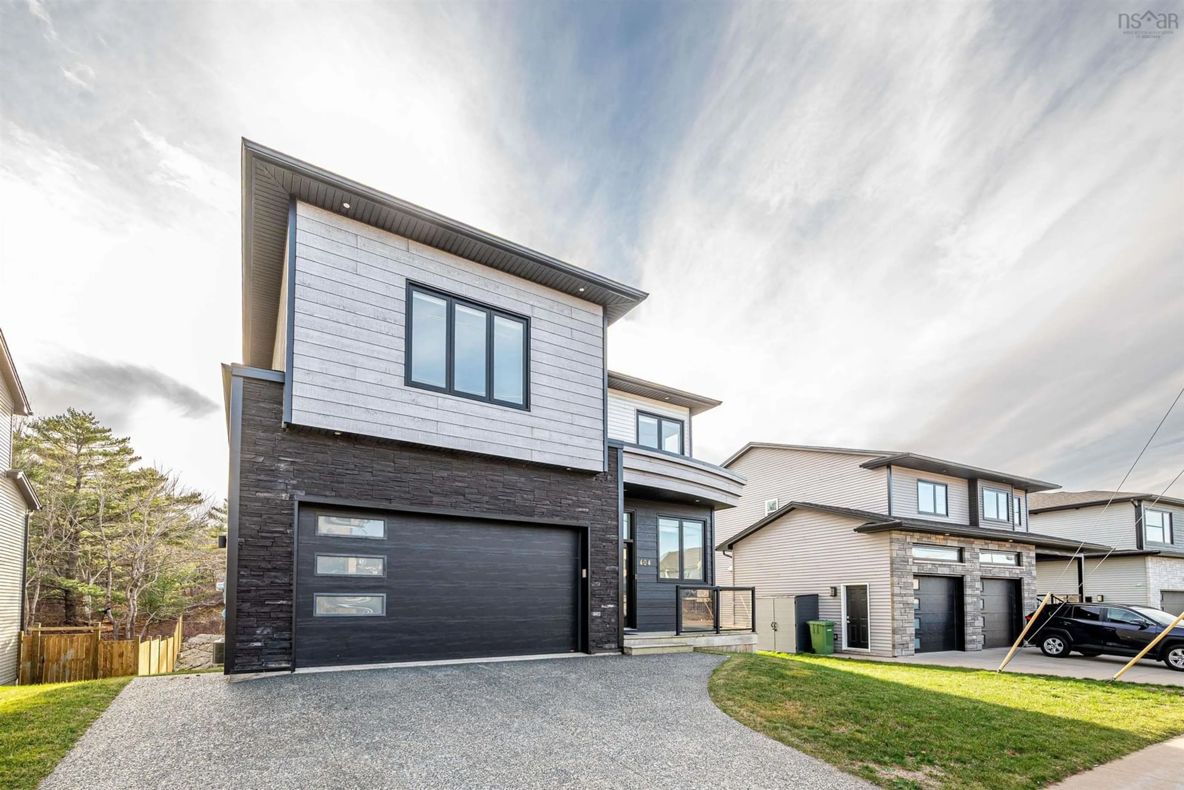 Home with brick exterior material, street for 404 Starboard Dr, Halifax Nova Scotia B3M 0L4