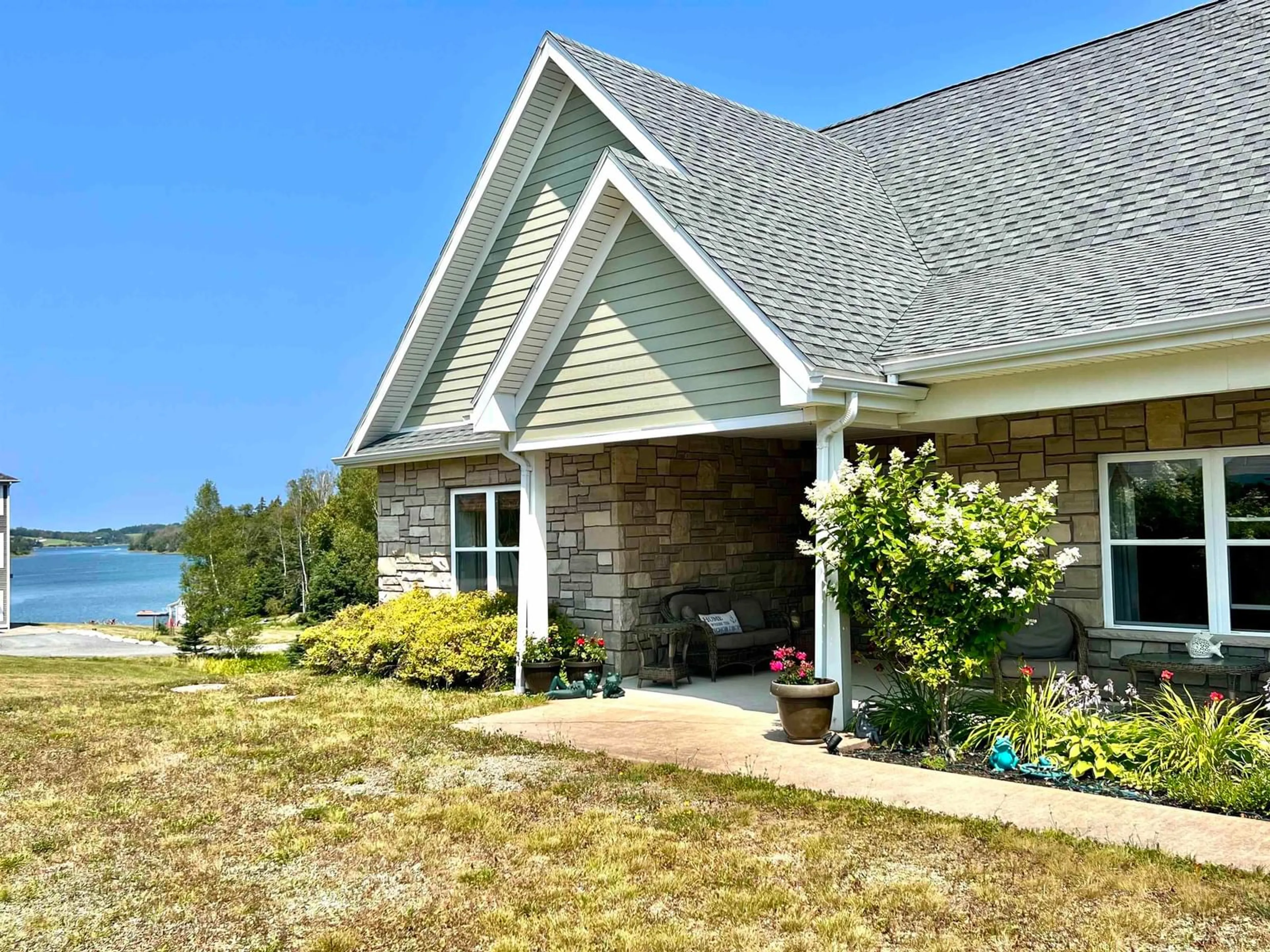 Home with vinyl exterior material, water/lake/river/ocean view for 114 Ocean Stone Dr, Garden Lots Nova Scotia B0J 2C0