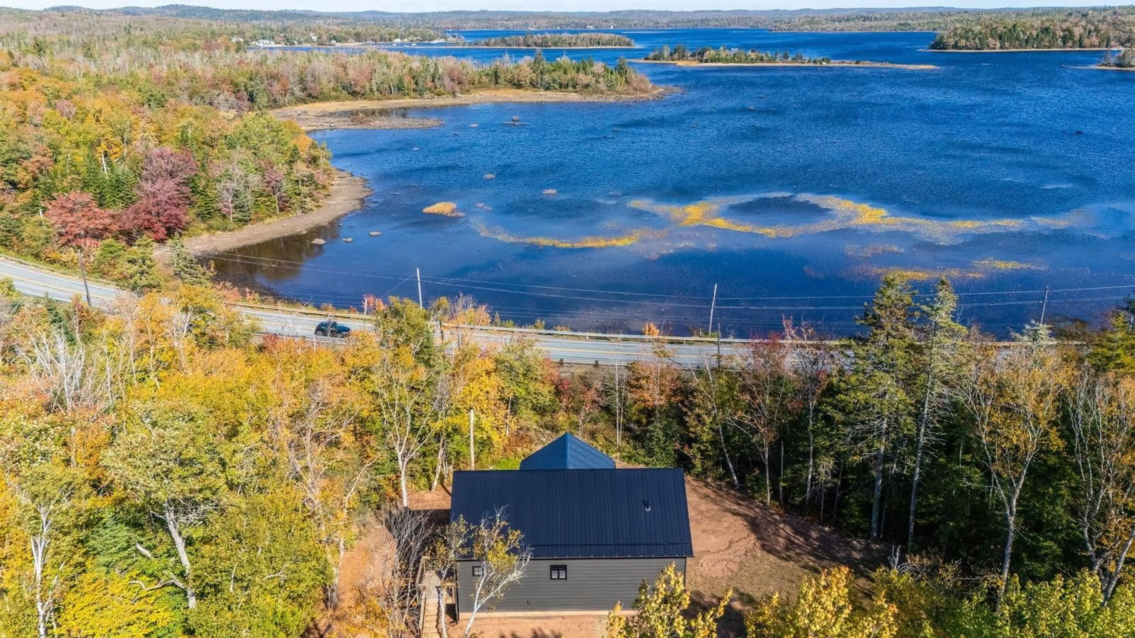 A pic from outside/outdoor area/front of a property/back of a property/a pic from drone, water/lake/river/ocean view for 67 Birchview Dr, Lake Charlotte Nova Scotia B0J 2L0